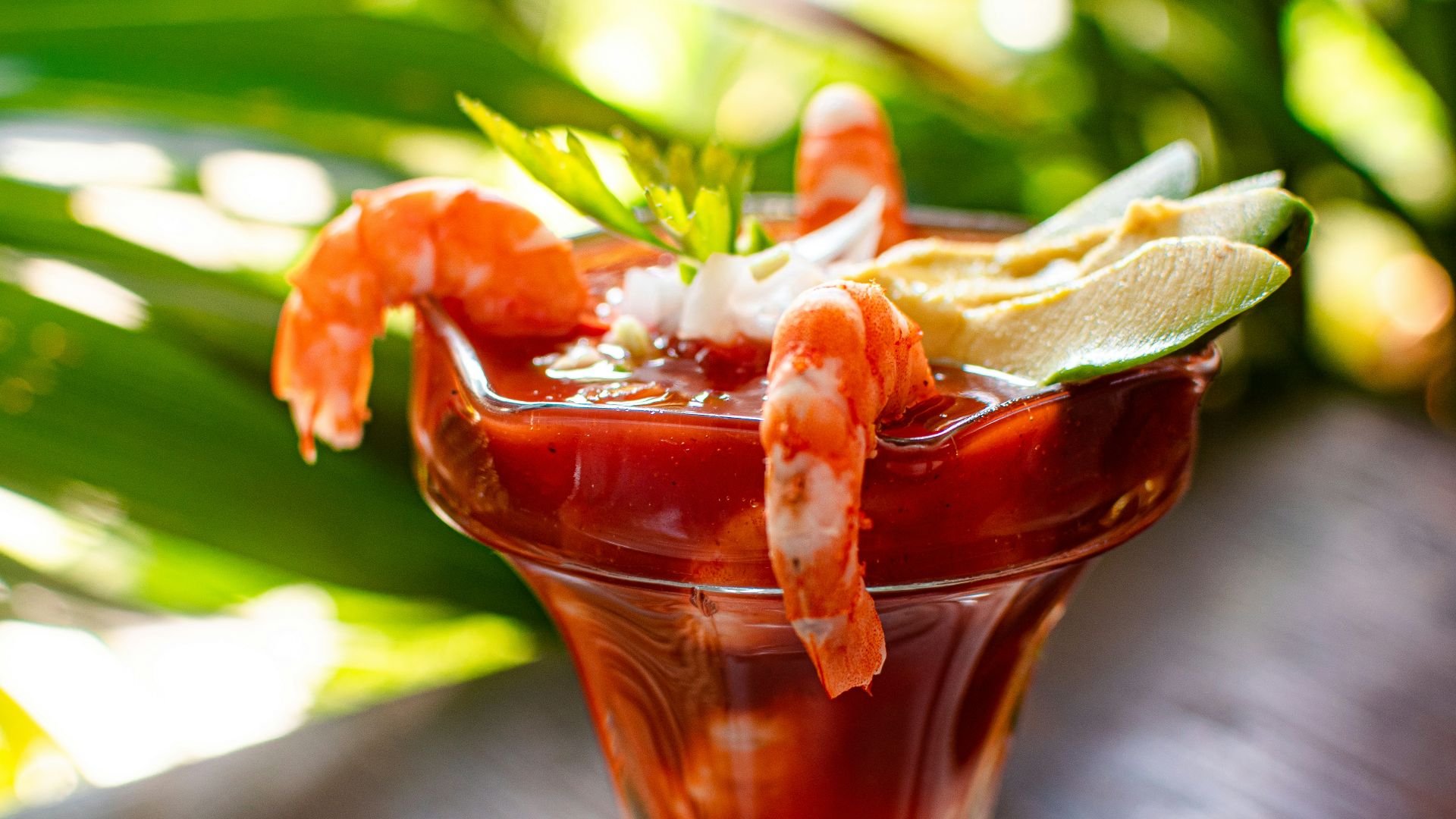 clear drinking glass with red liquid