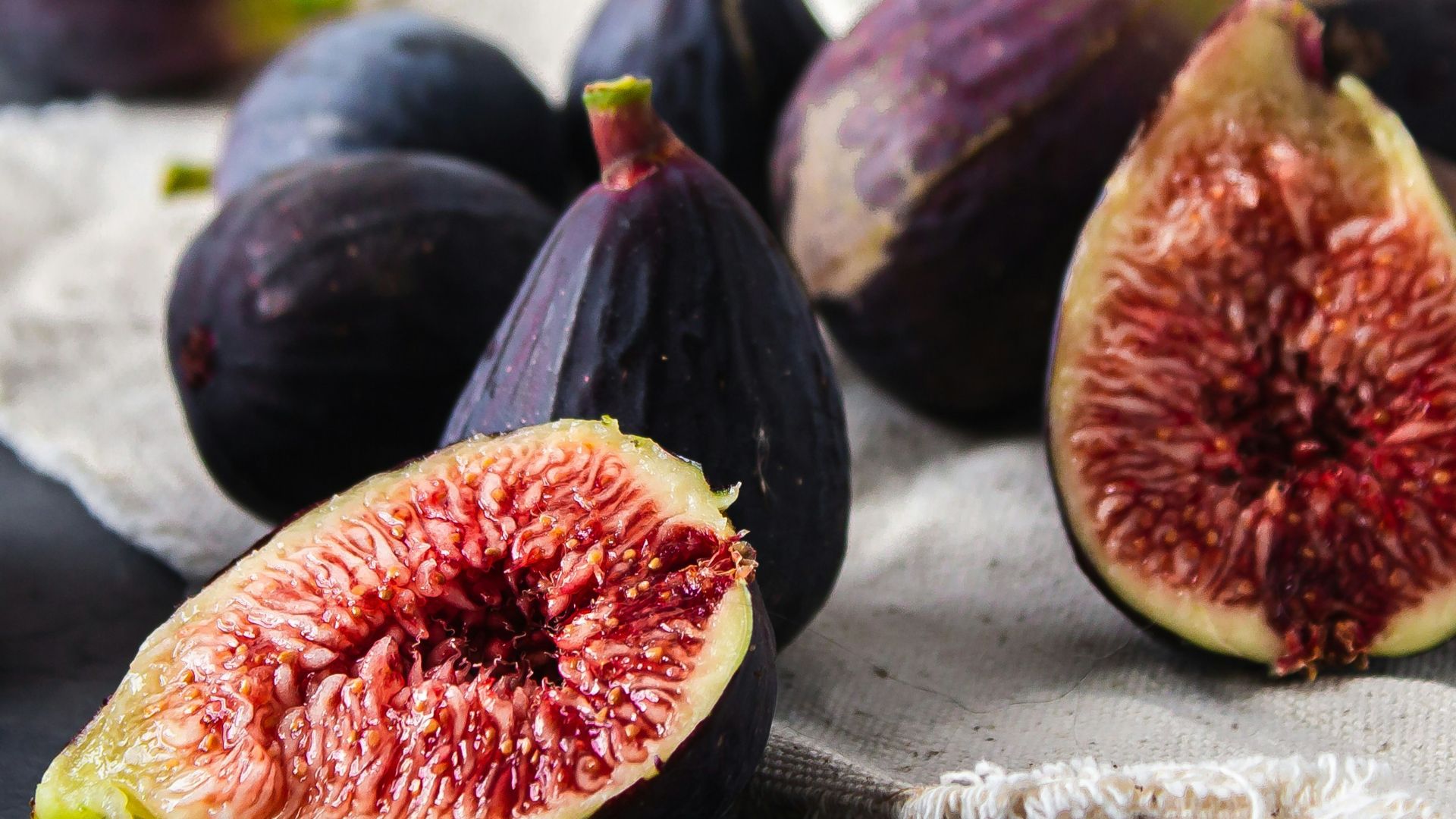 purple and red round fruit