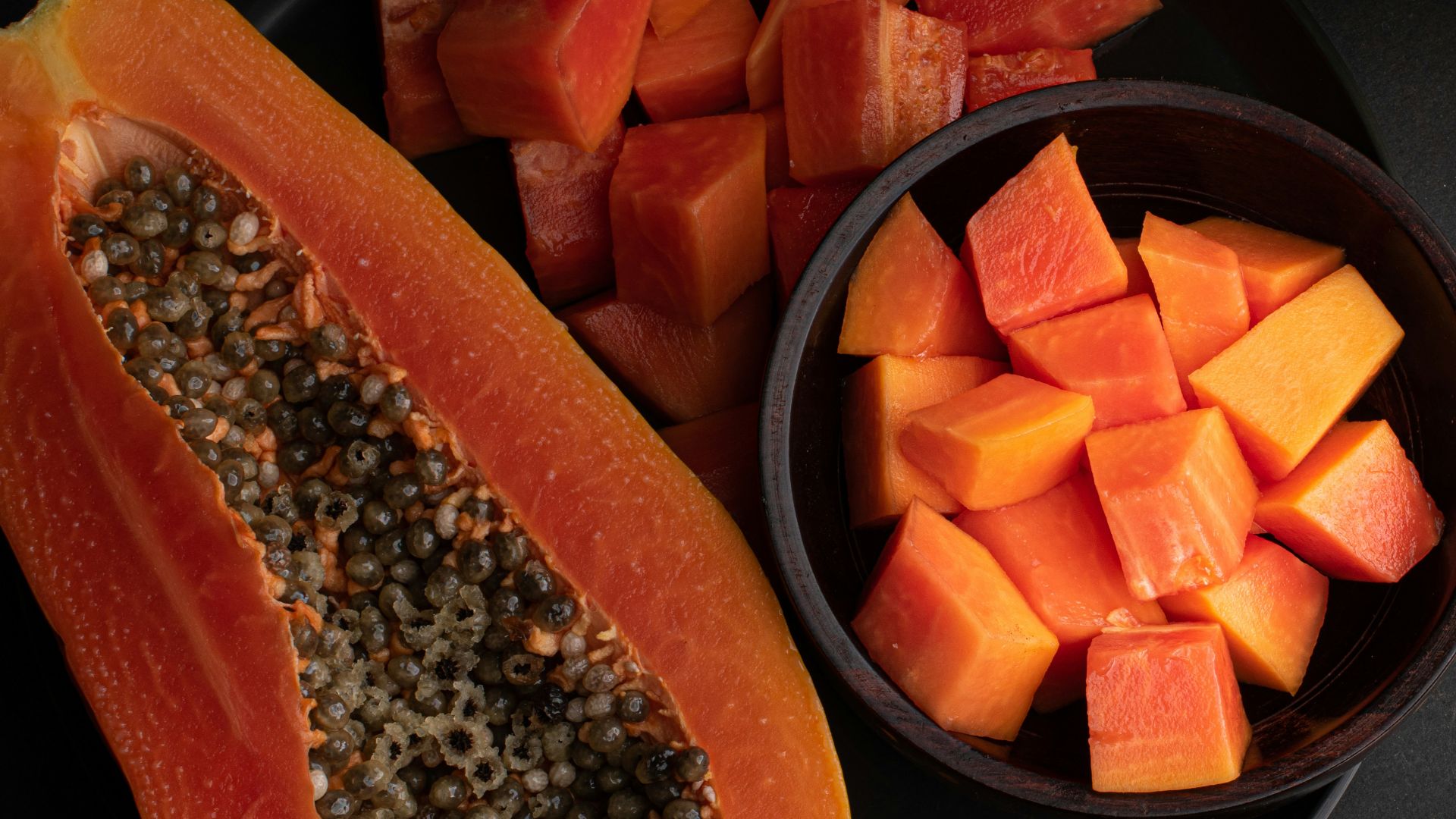 sliced carrots on black plate