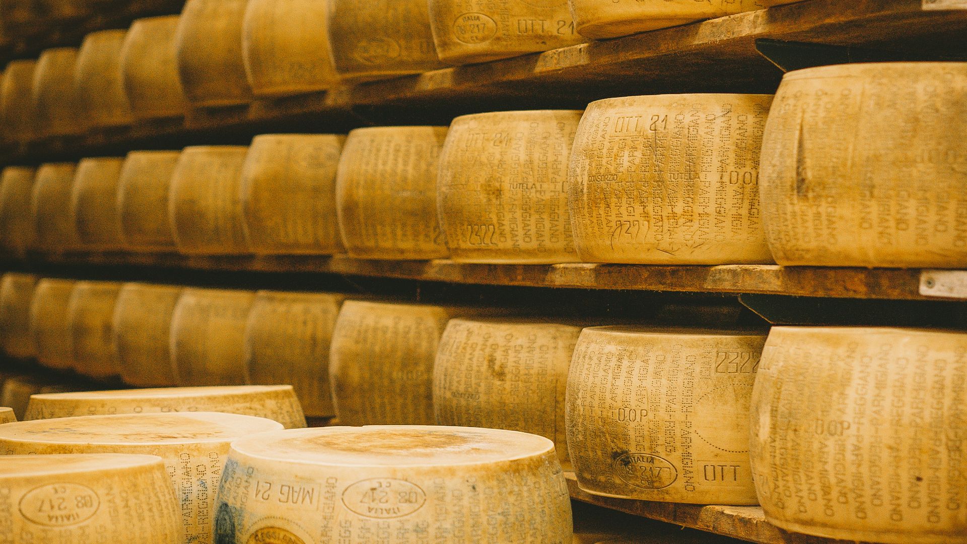 a group of white containers with brown powder on them