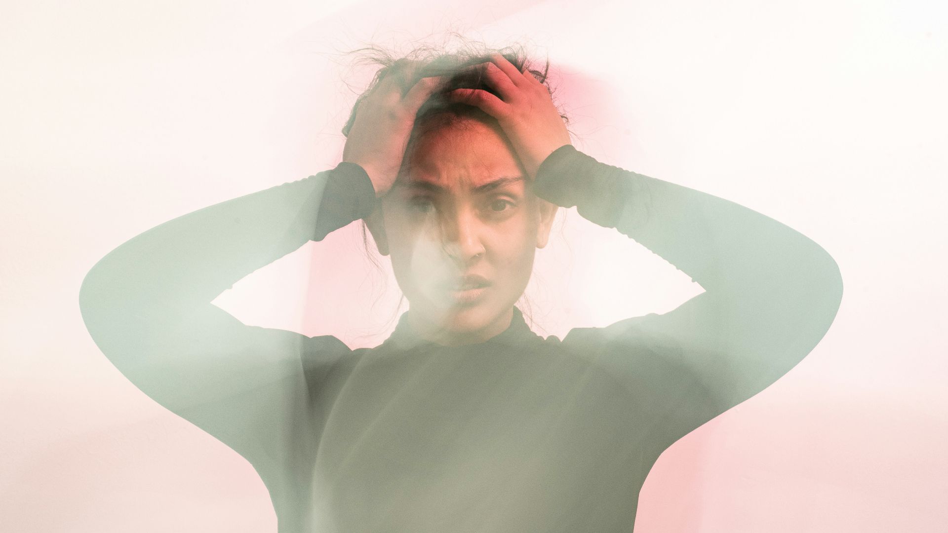 woman in gray turtleneck long sleeve shirt