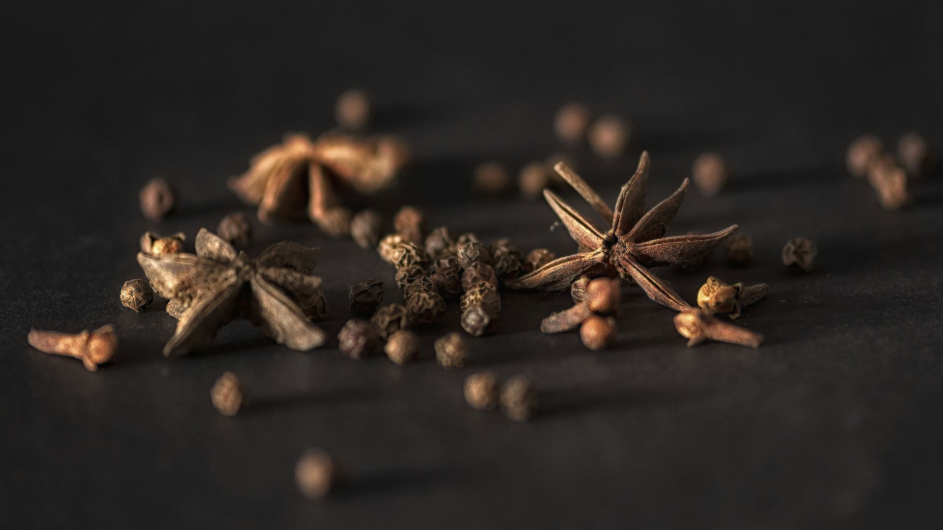selective focus photography of star anise