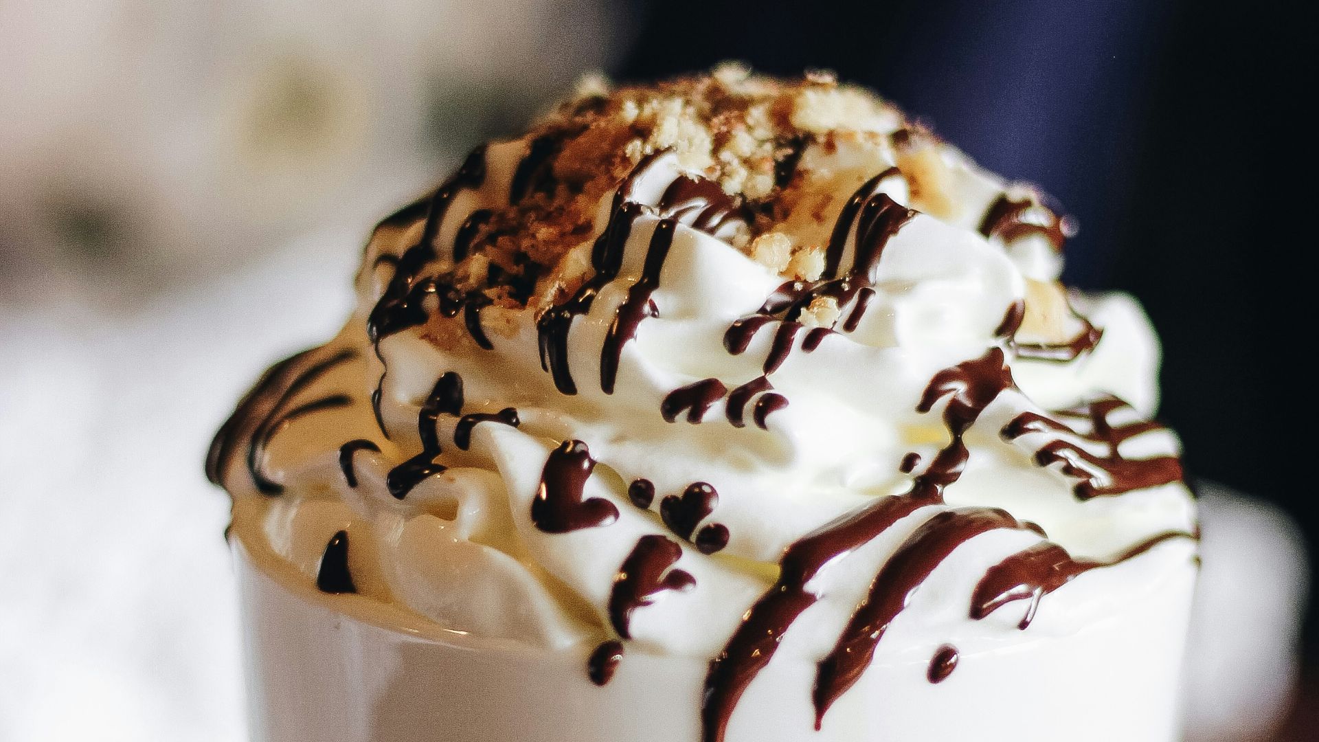 vanilla flavor ice cream with chocolate syrup