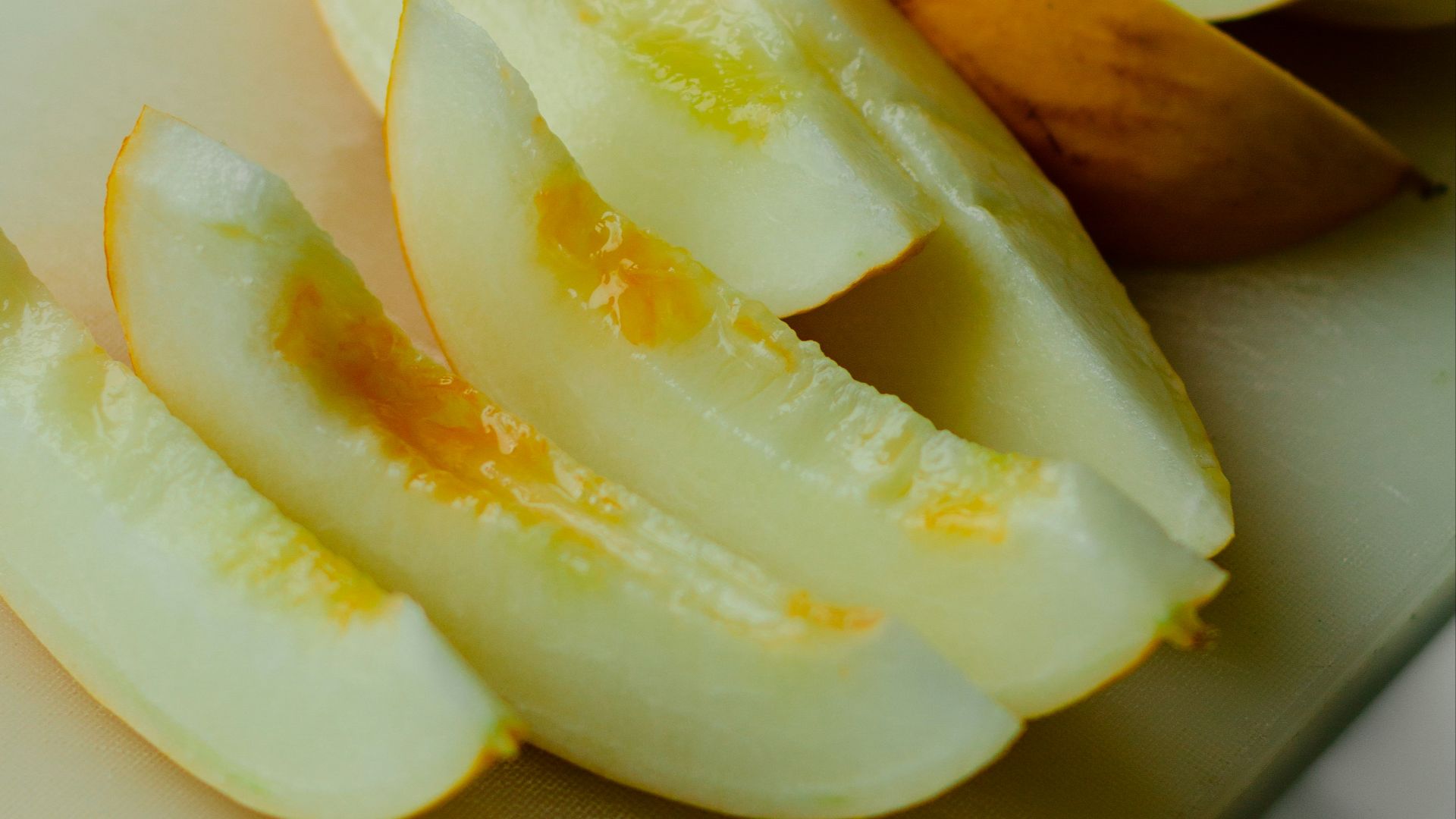 sliced apple on white ceramic plate