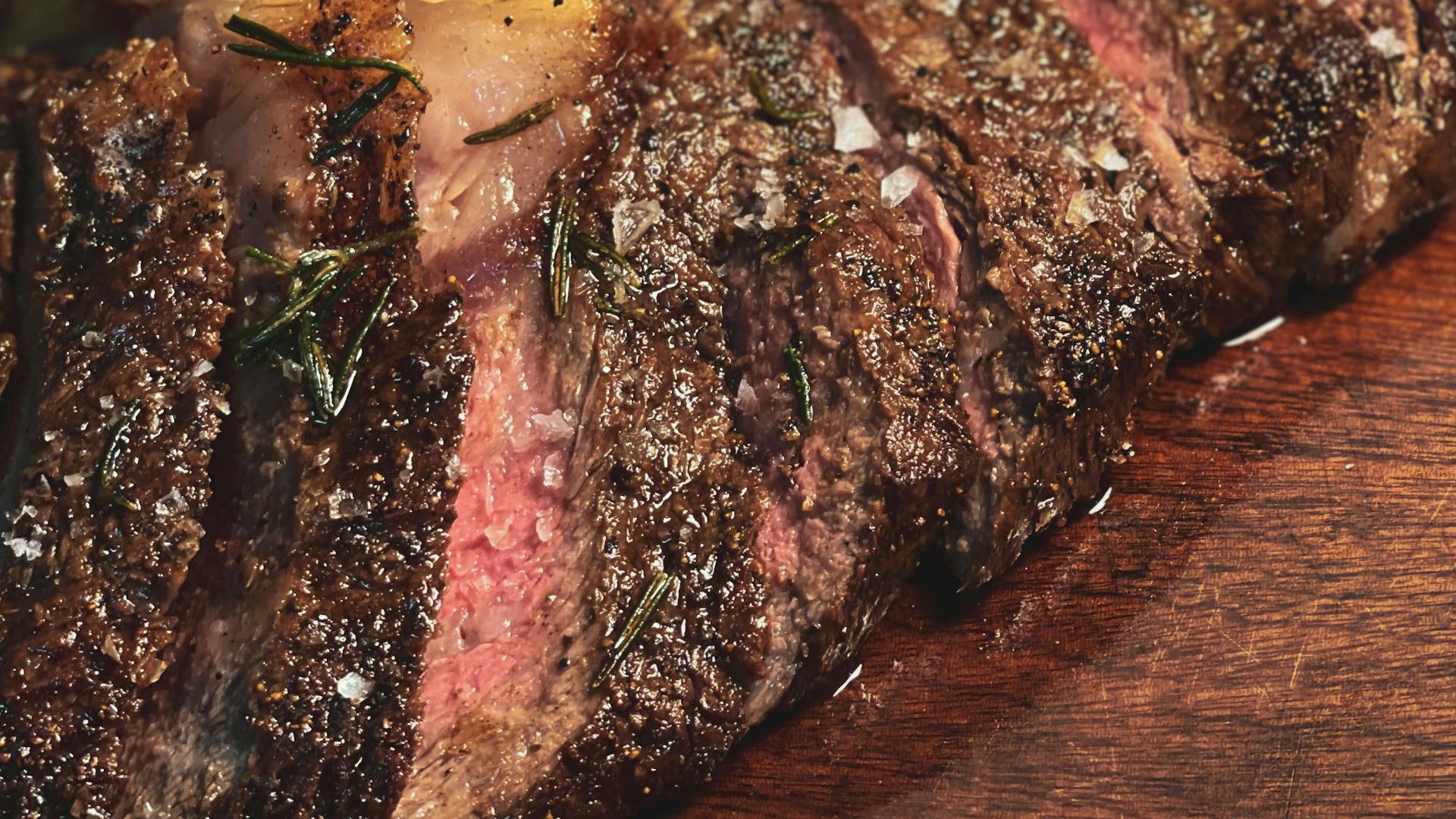 grilled meat on brown wooden table