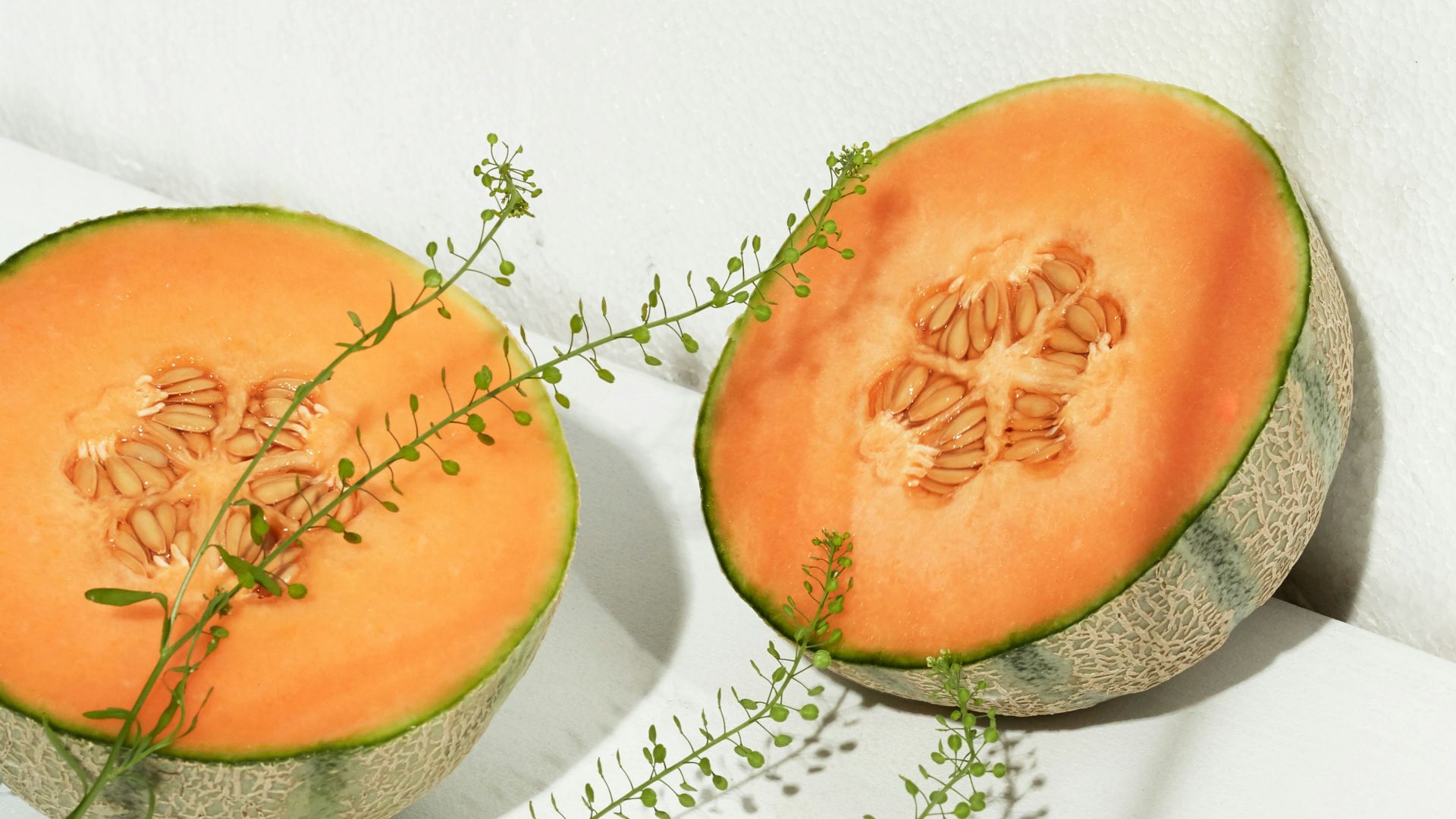 sliced orange and green fruit