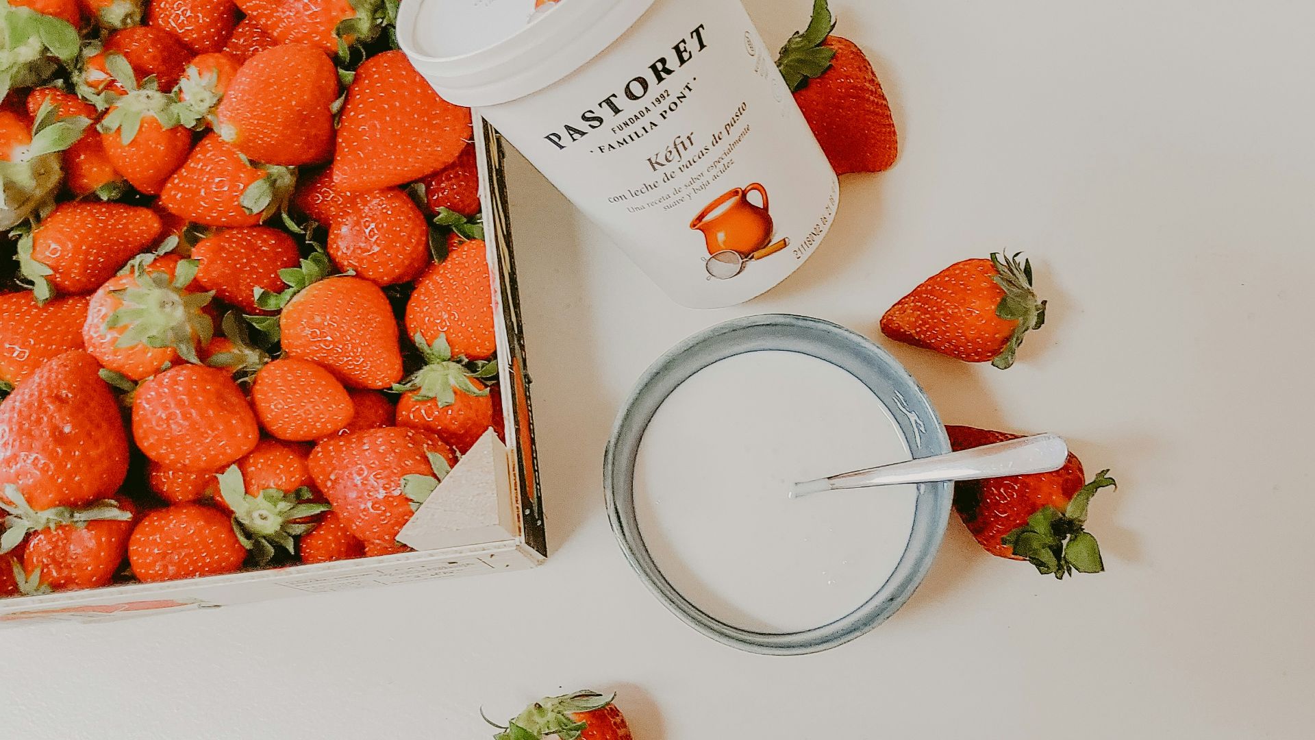 strawberries on white plastic cup