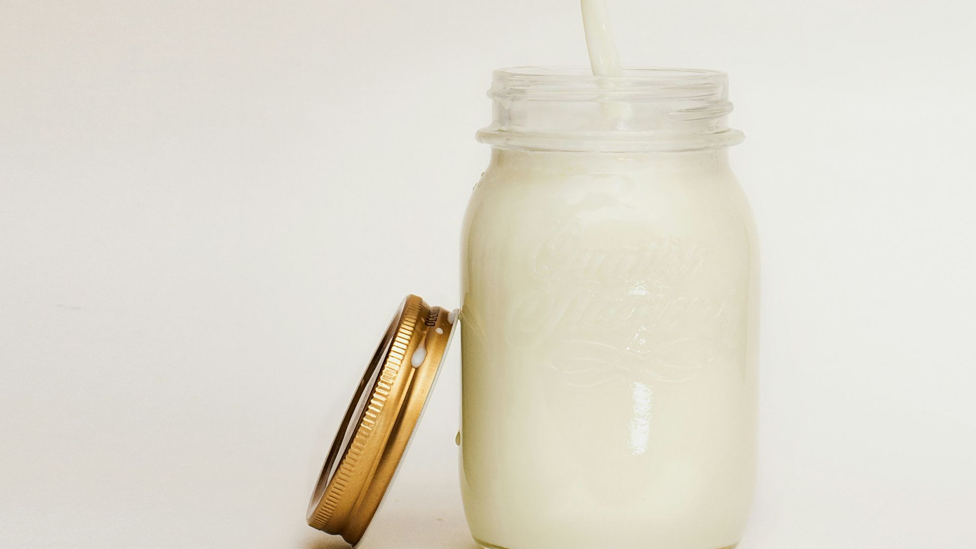 mason jar filled with smoothie