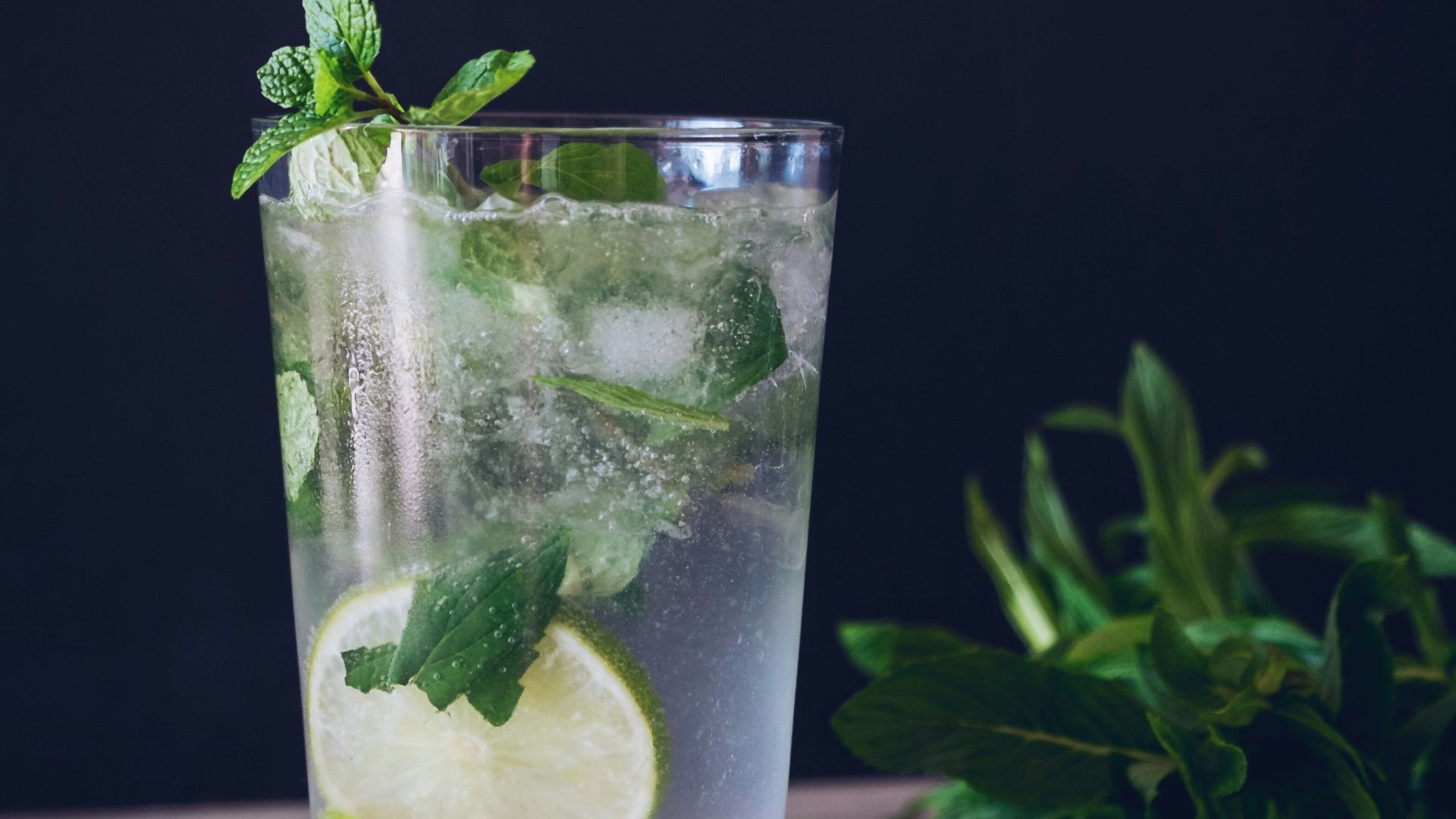 clear glass cup filled with water and lemon