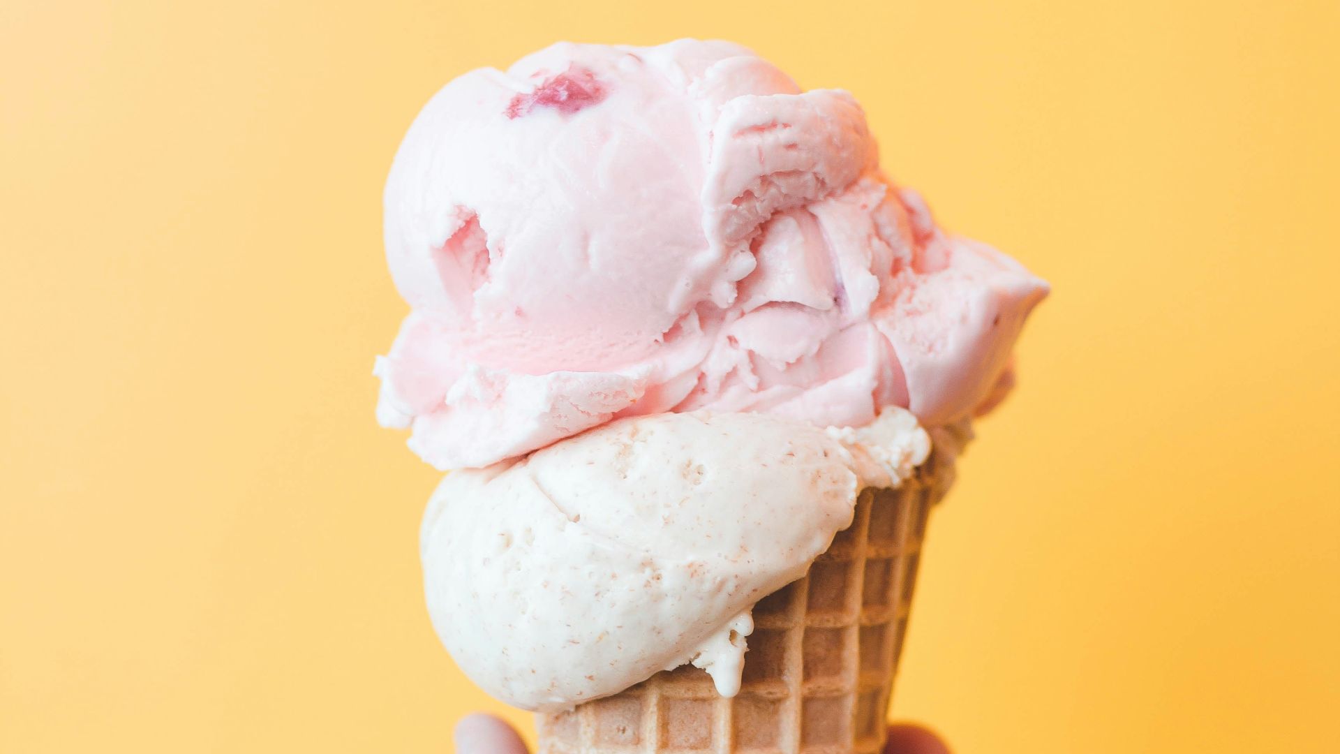 strawberry ice cream on cone