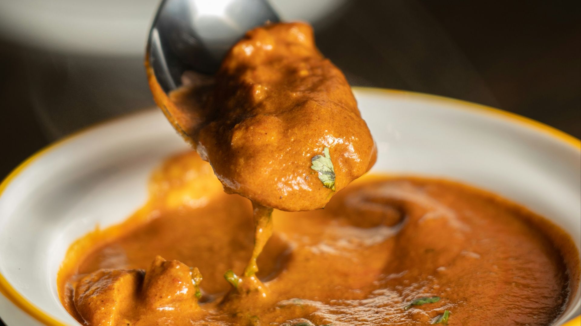 orange mushy dish in bow