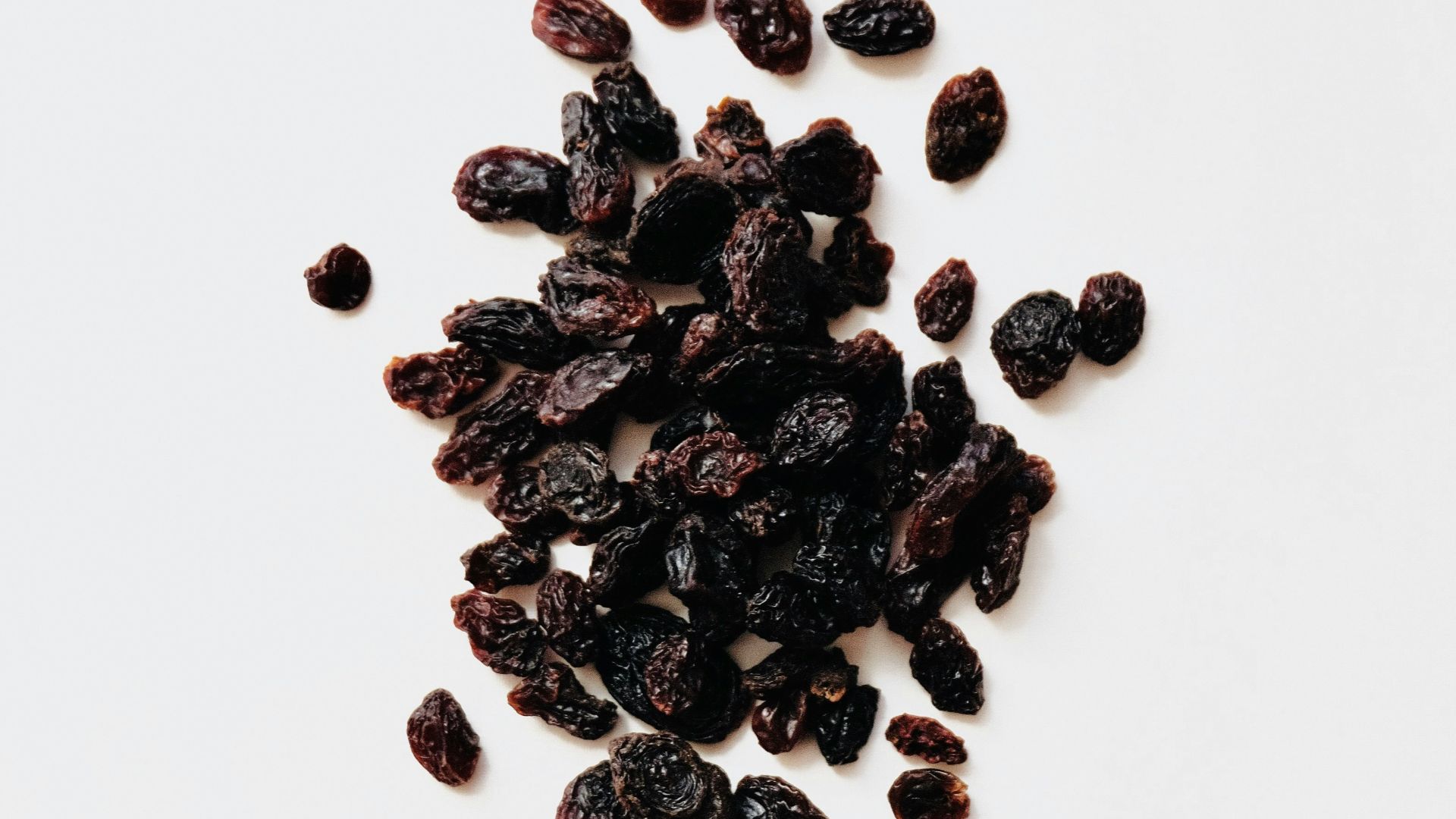 black round fruits on white background