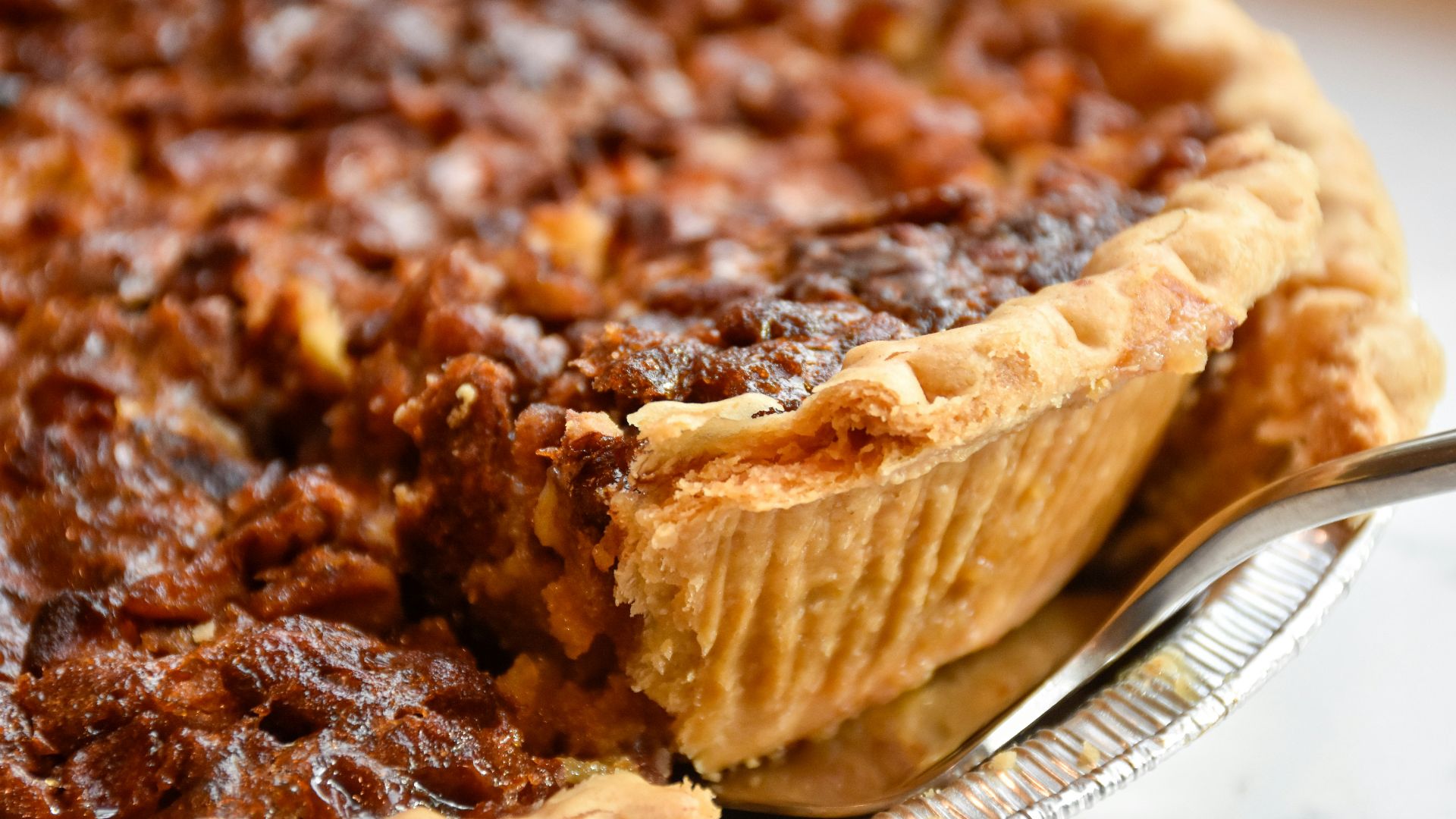 brown pie on white ceramic plate