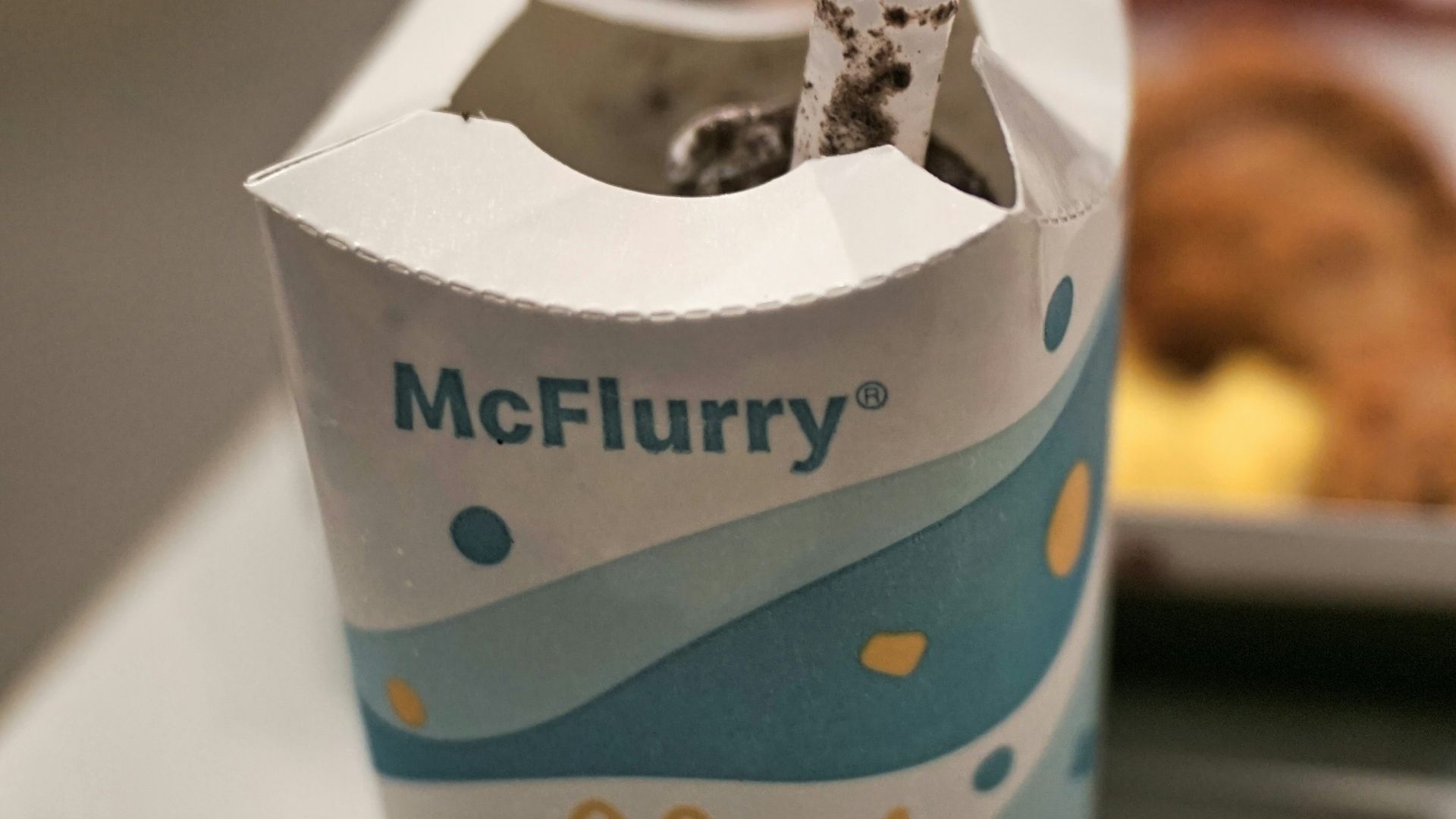 white and blue paper bag