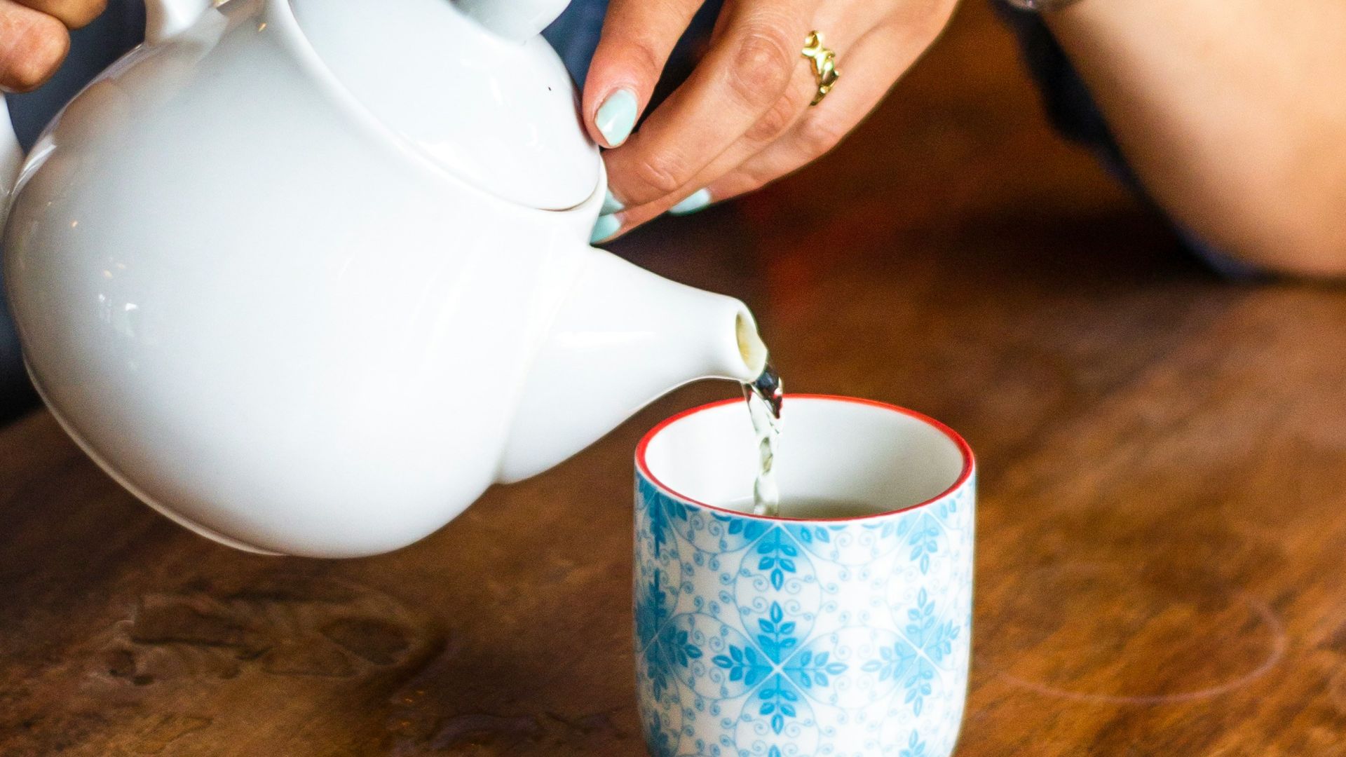 woman holding teapot