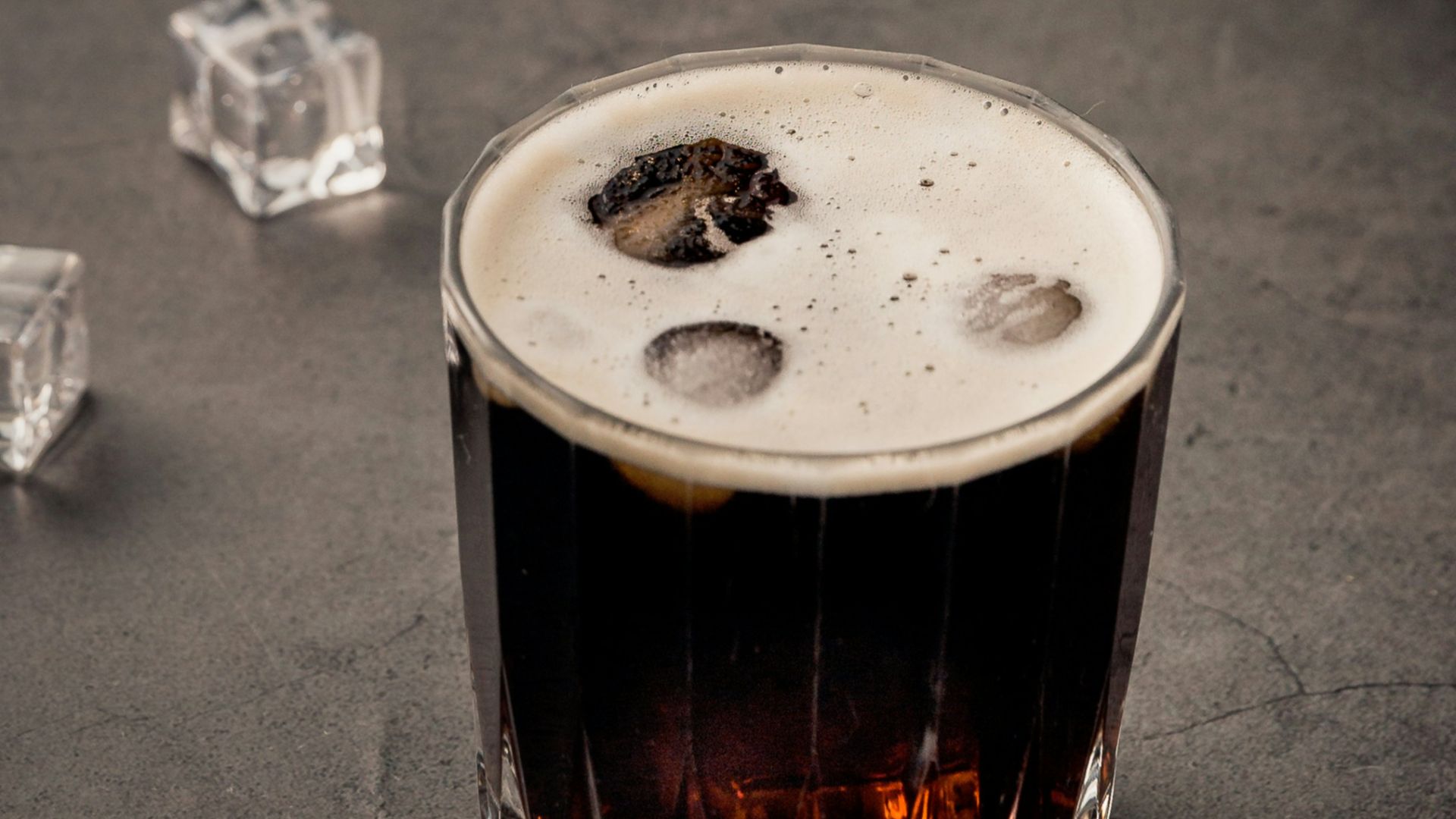 clear glass cup with beverage