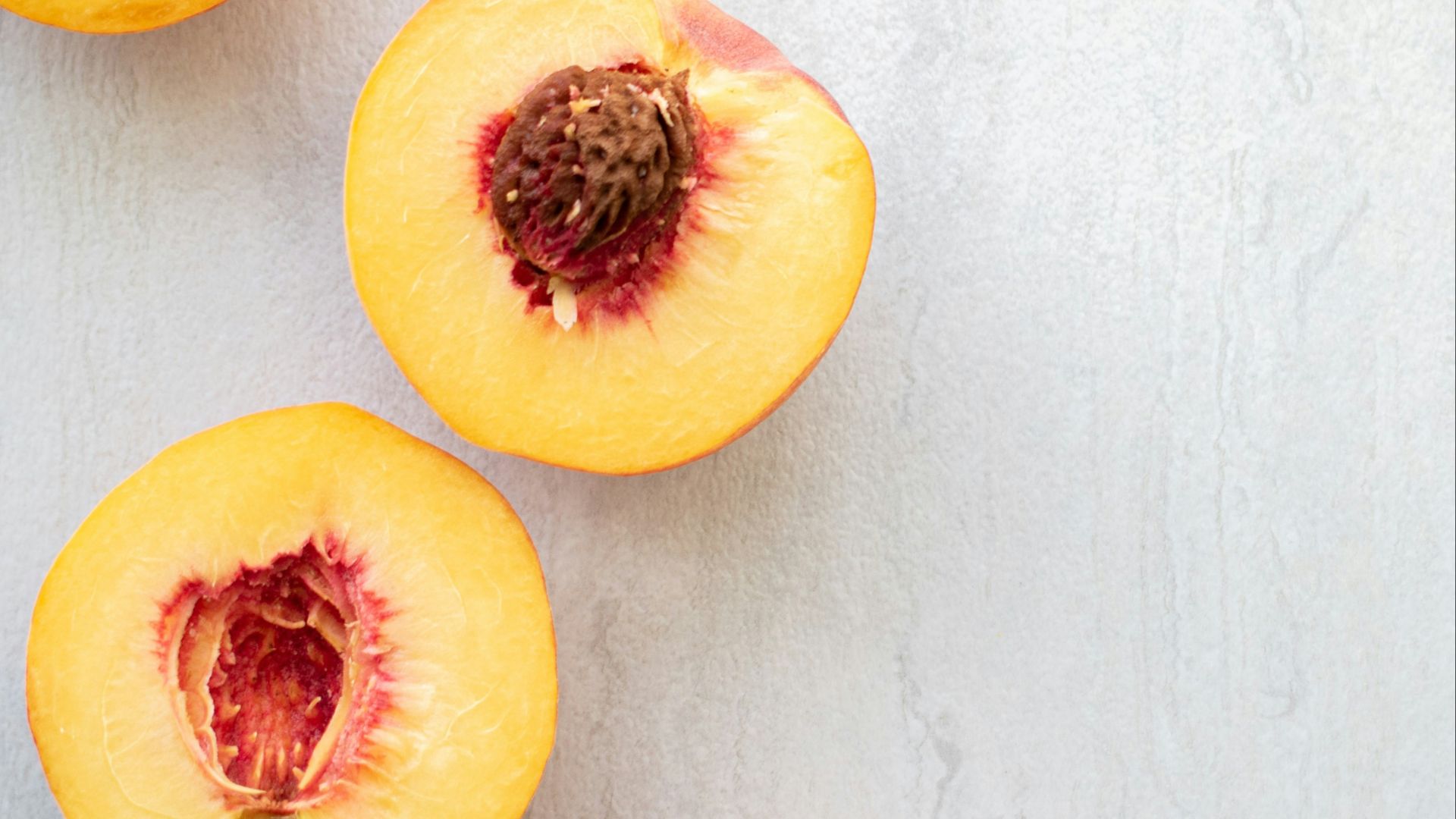 sliced red and yellow fruit