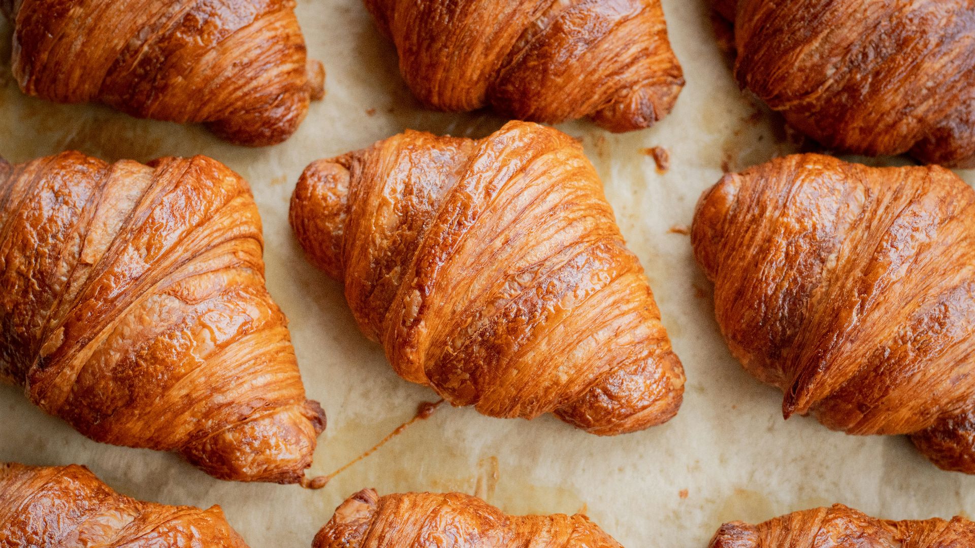 a bunch of croissants that are on a table