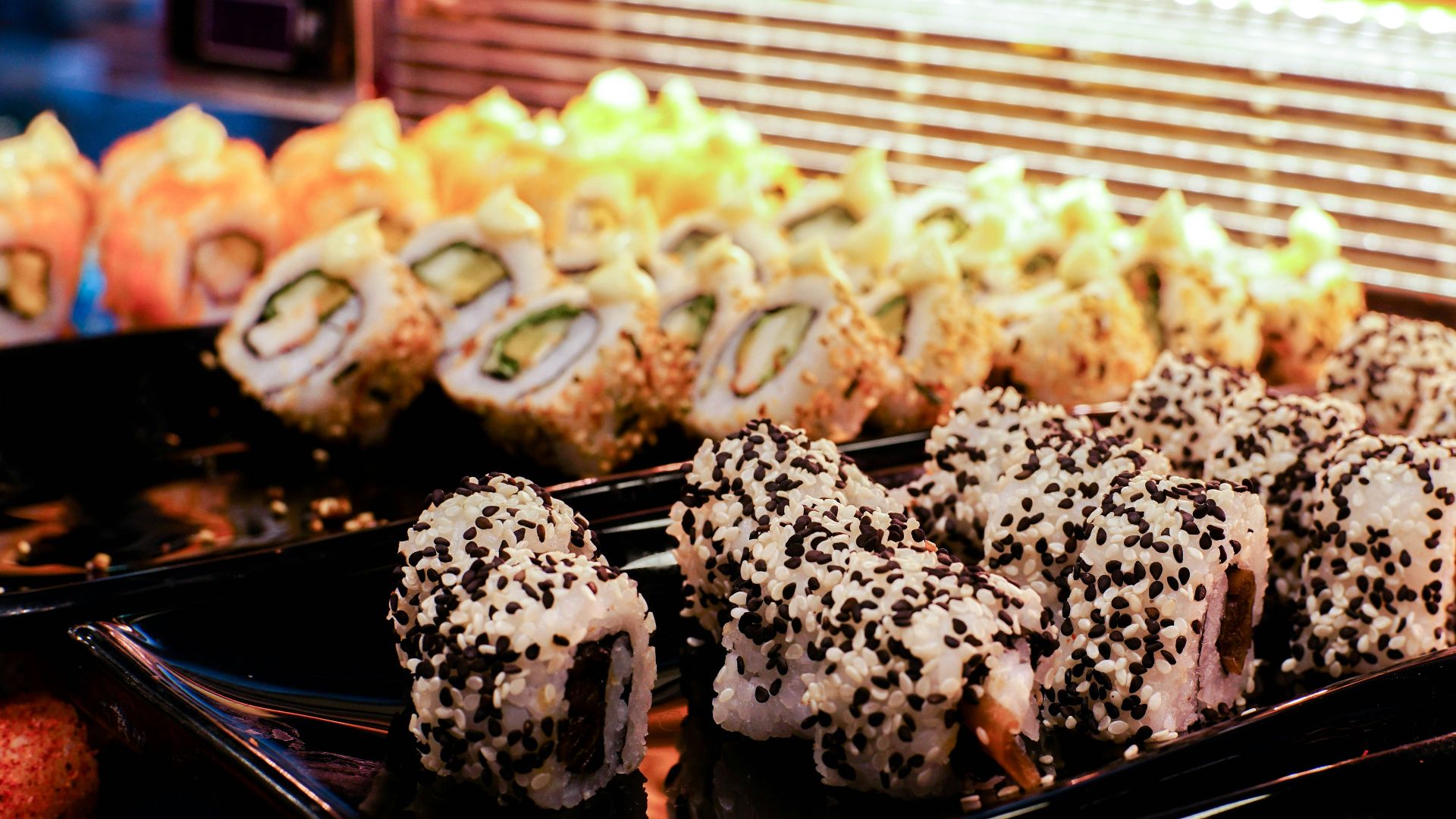 brown and white pastry on black tray
