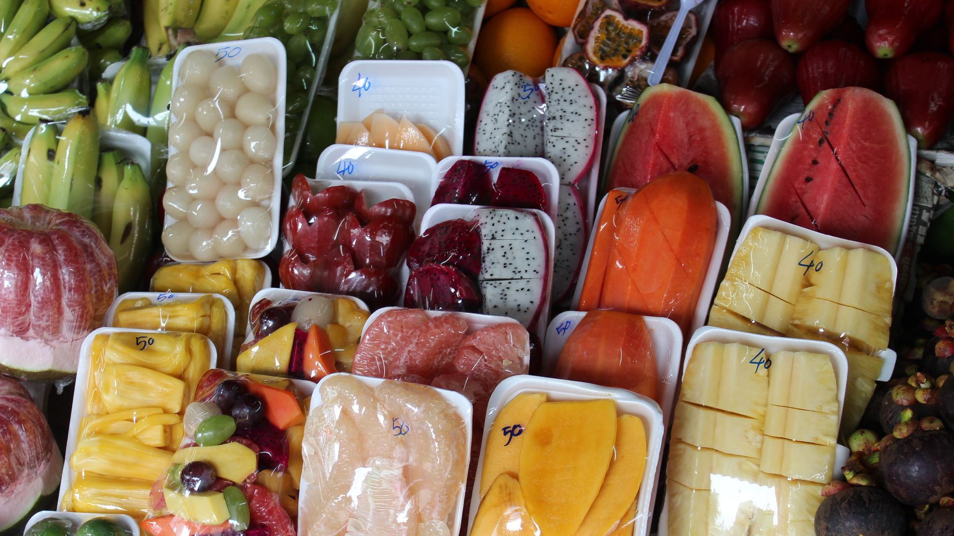 File:Tropical Sliced fruit for sale.JPG