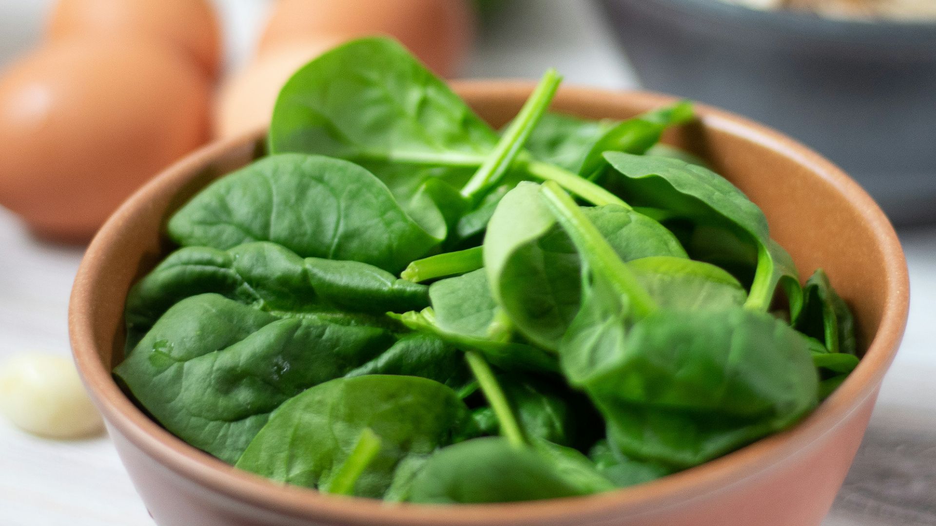 green vegetable on white ceramic bowl