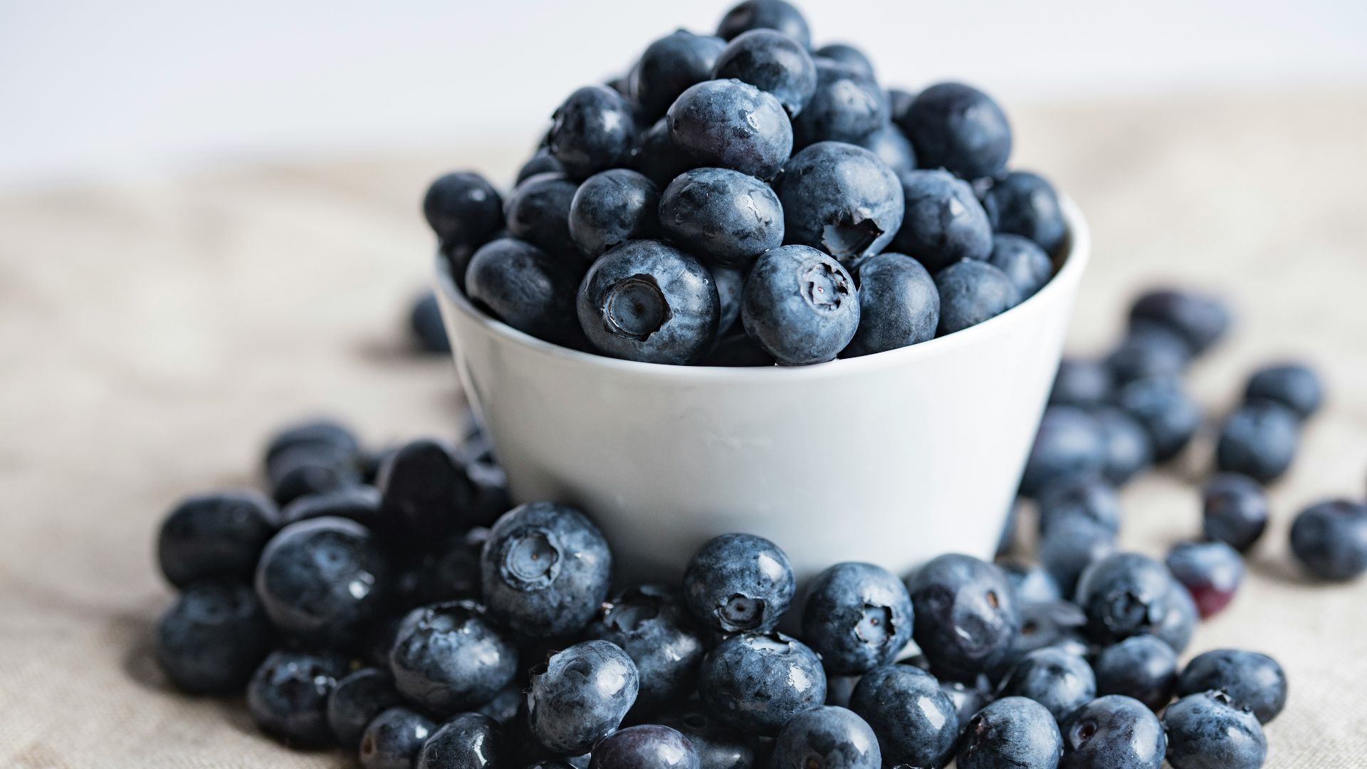 blueberries on white ceramic container