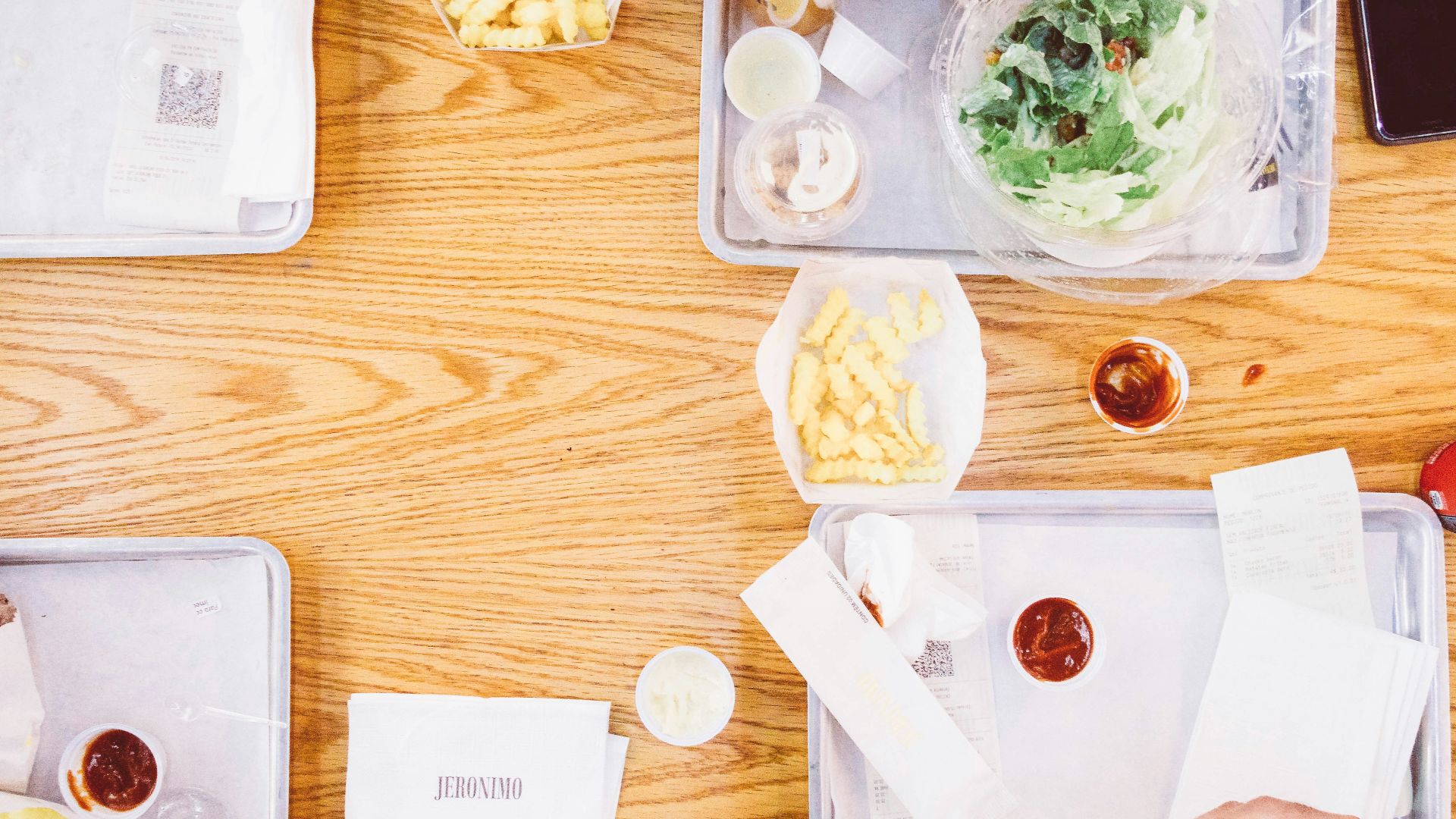 assorted dishes on trays at tabletop
