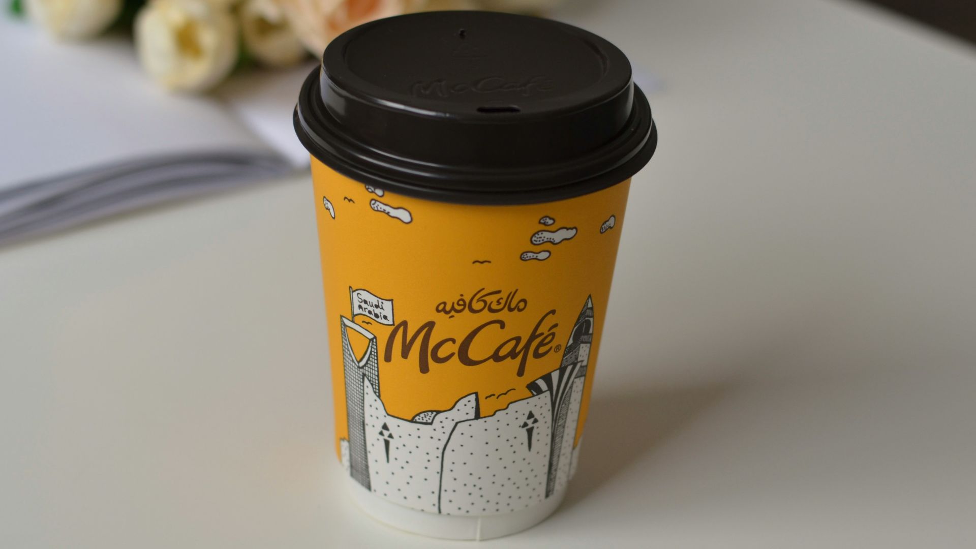 A cup of coffee sitting on top of a table