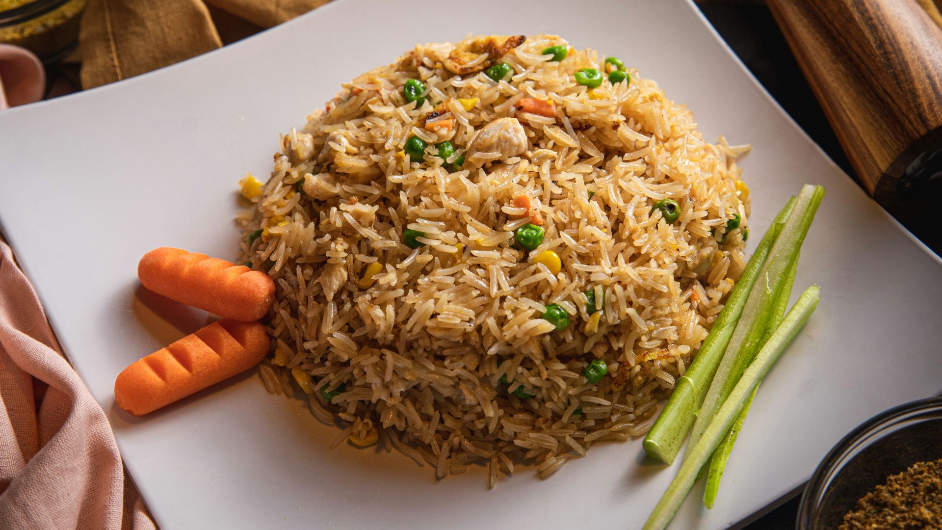 brown and green dish on white ceramic plate