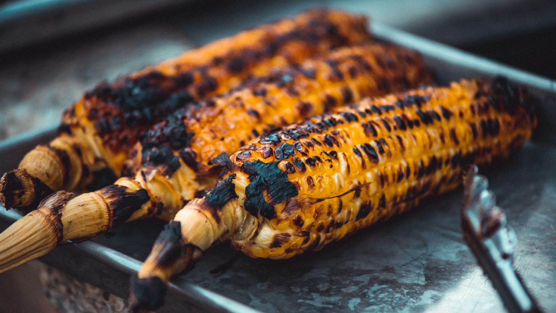 grilled meat on black tray