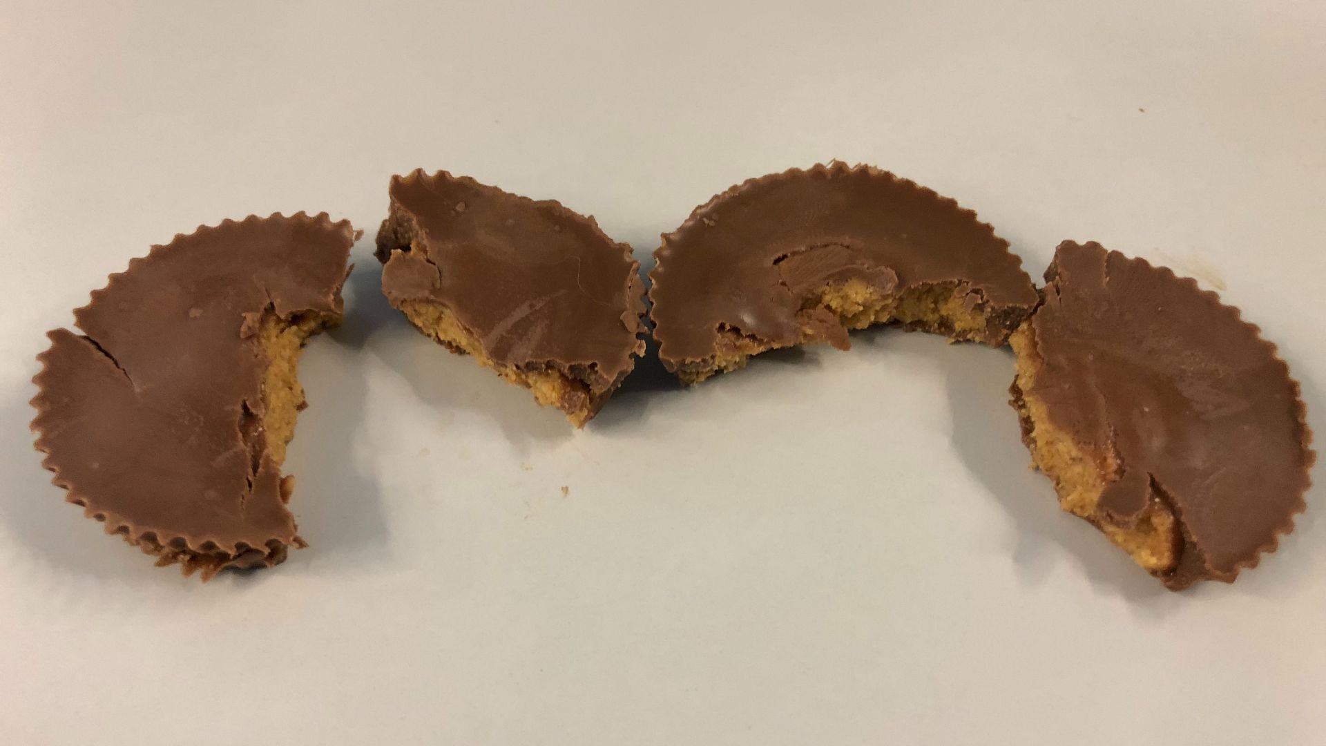 File:2019-04-06 14 13 49 Two Reese's Milk Chocolate Peanut Butter Cups broken into pieces in the Dulles section of Sterling, Loudoun County, Virginia.jpg