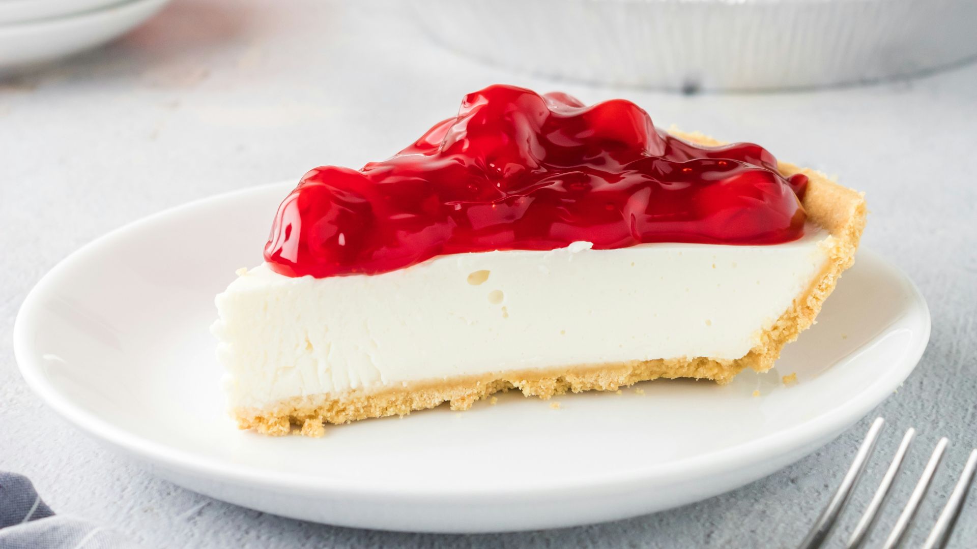 red and white cake on white ceramic plate