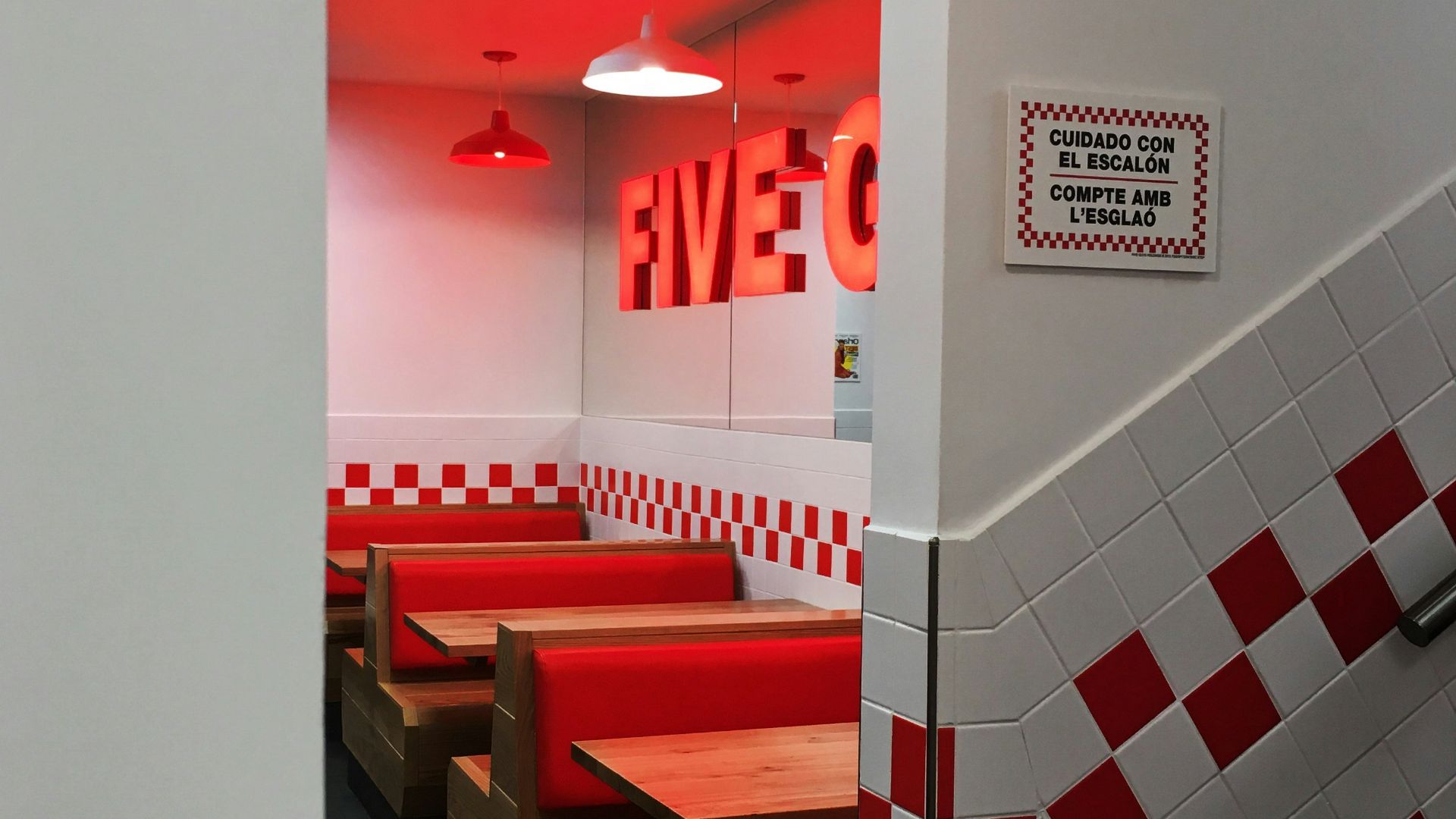 red and brown wooden bench