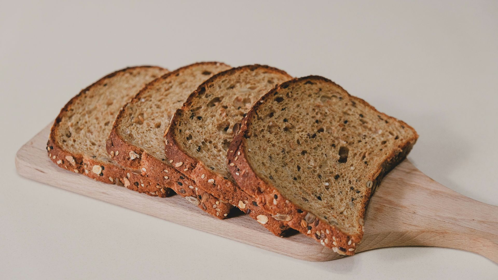 sliced bread on white table