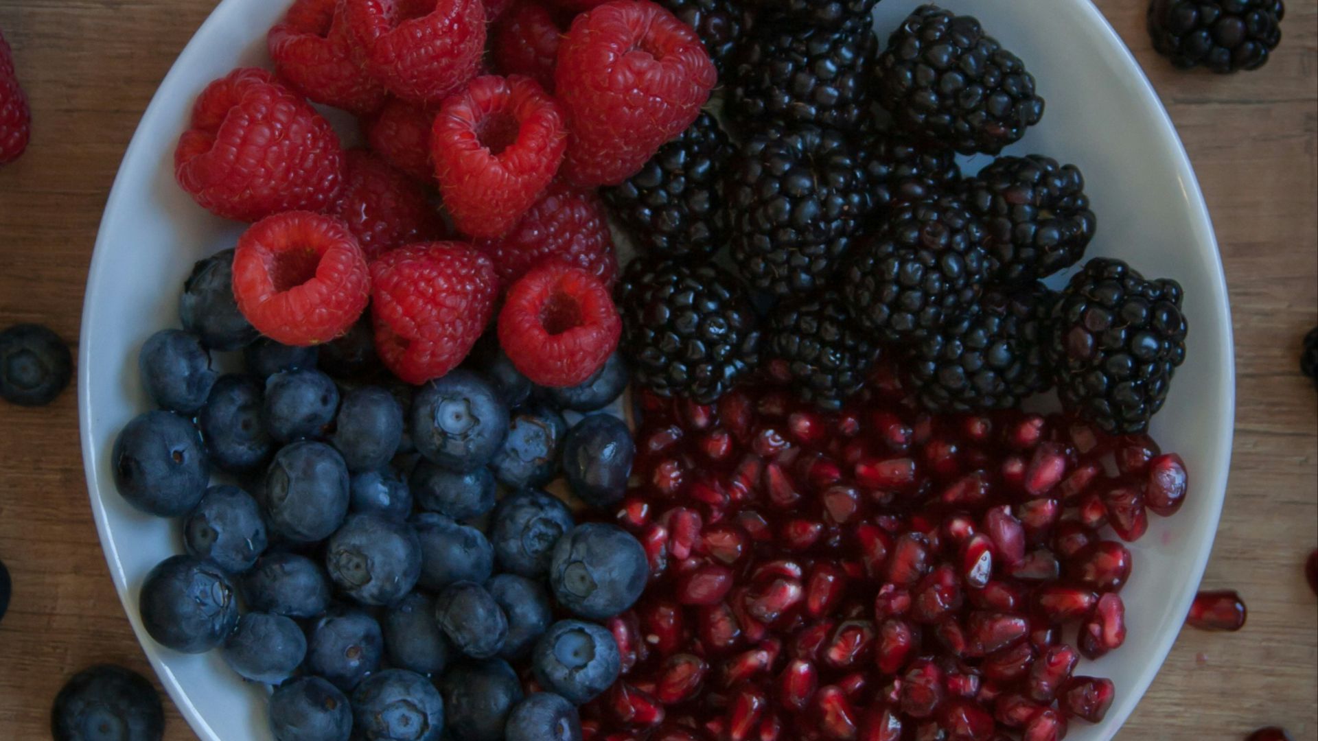strawberries on white ceramic bowl