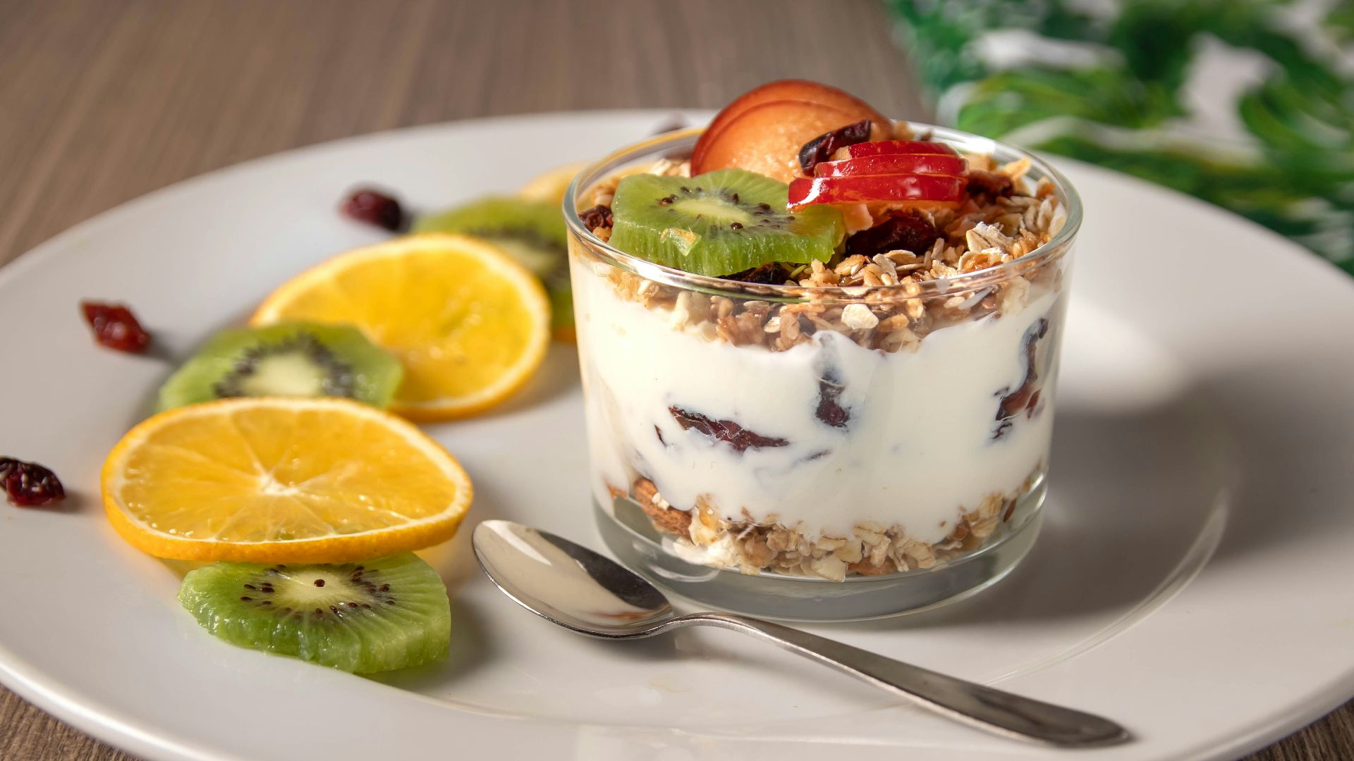 ice cream with sliced lemon on white ceramic plate