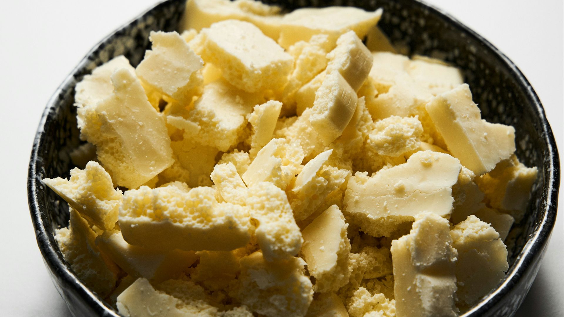 a bowl of food that is on a table