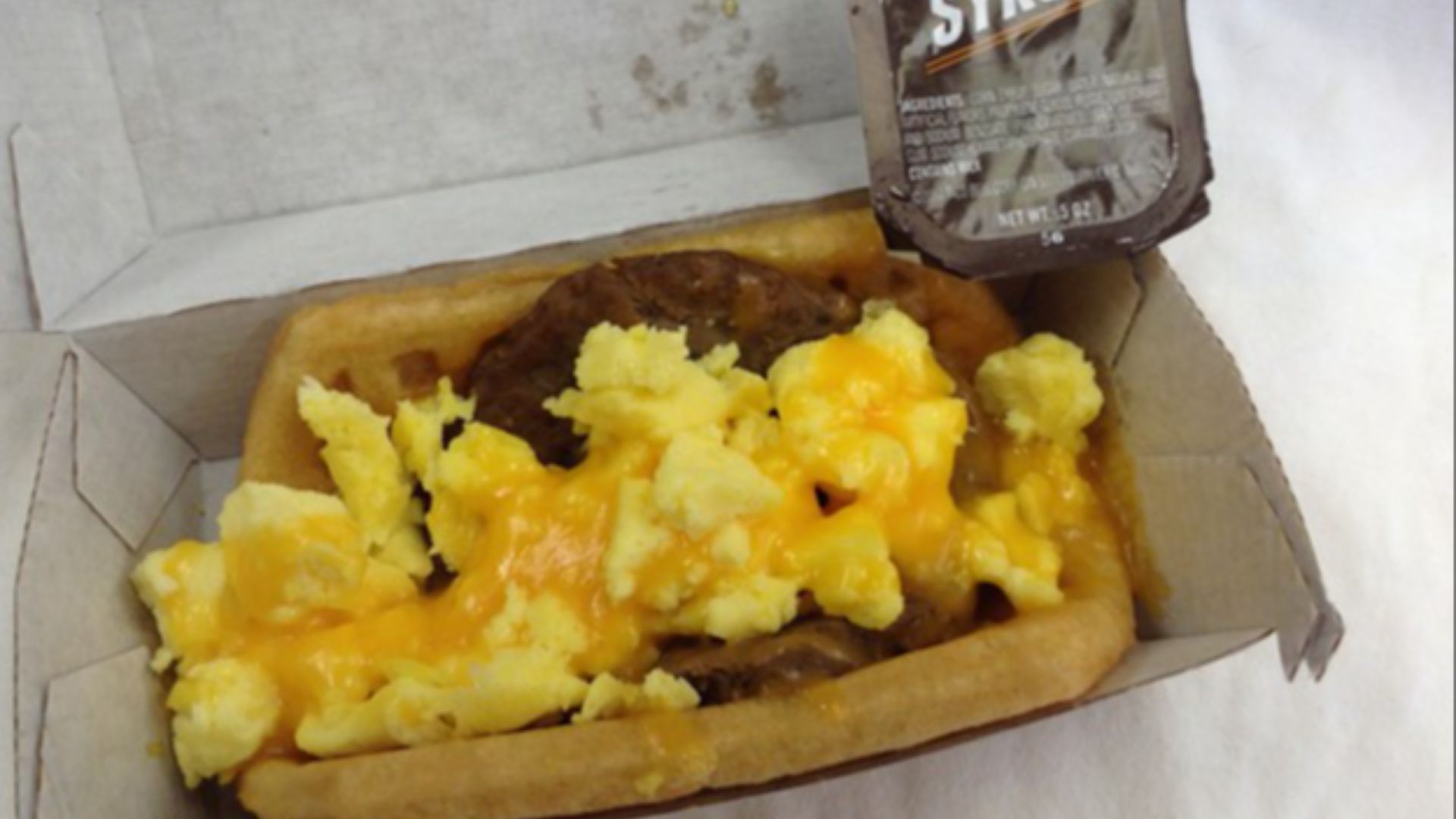 File:Taco Bell Sausage Waffle Taco (13572728574).jpg