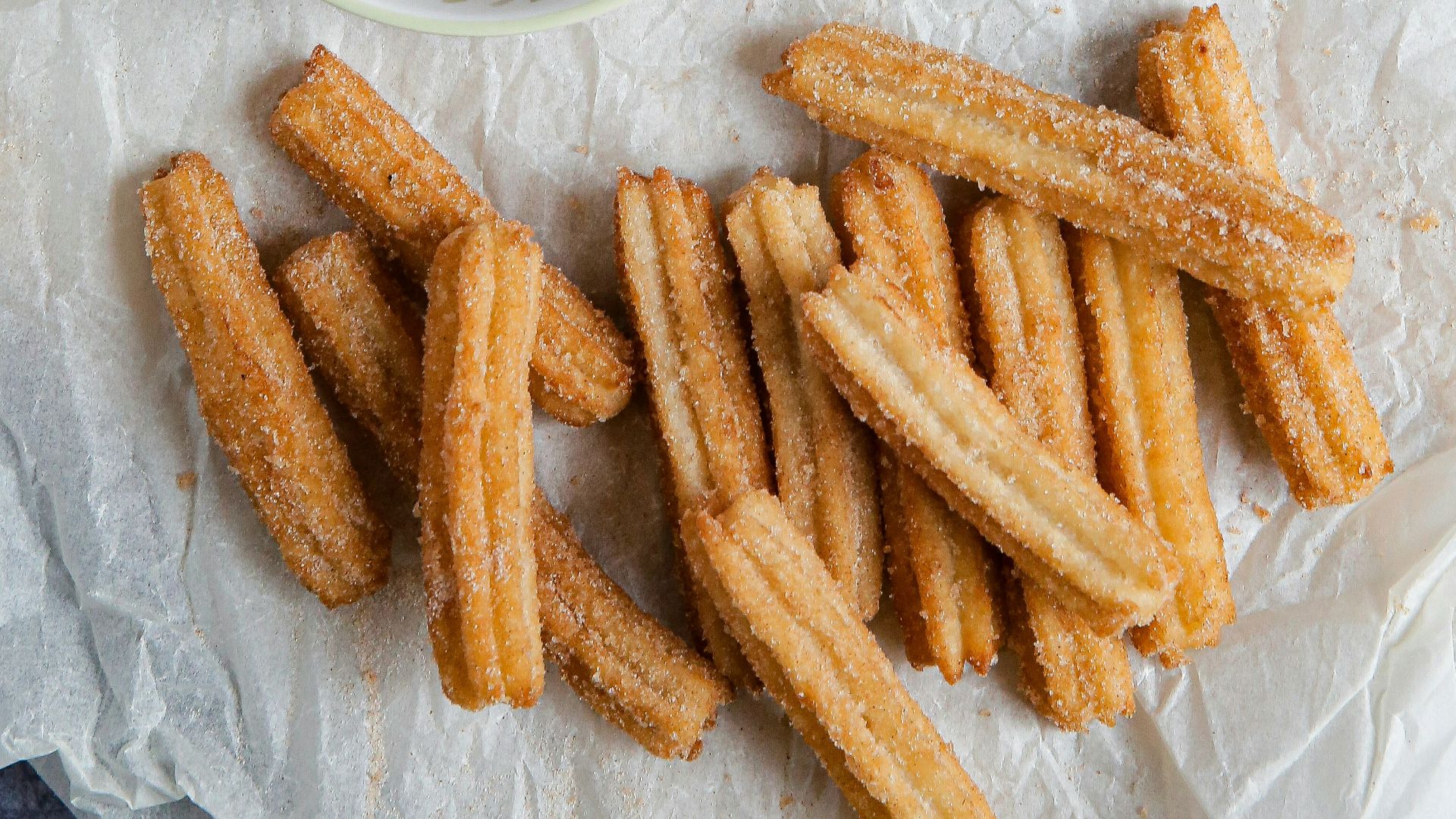 brown sausage on white ceramic plate