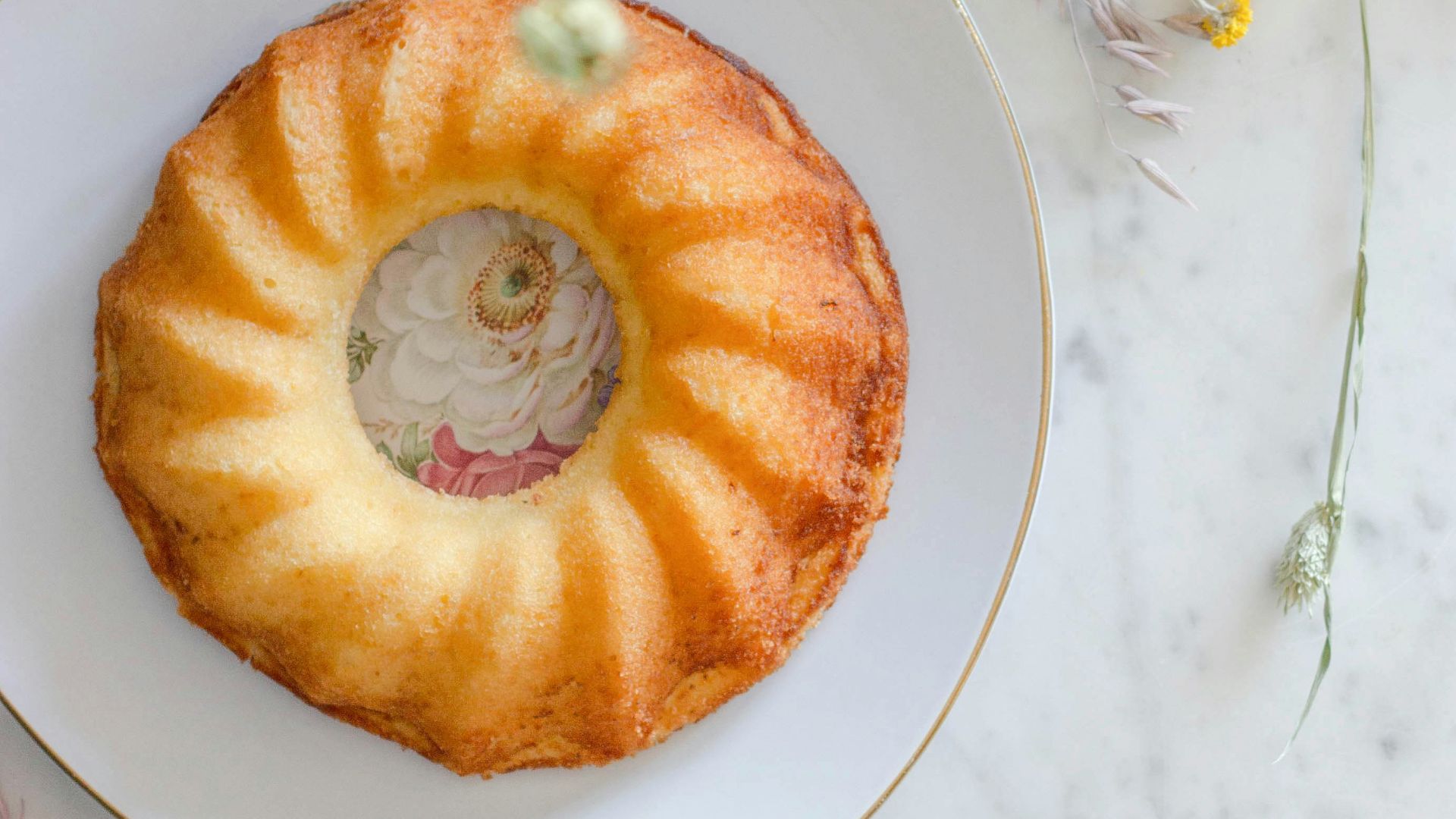 sliced orange fruit on white ceramic plate