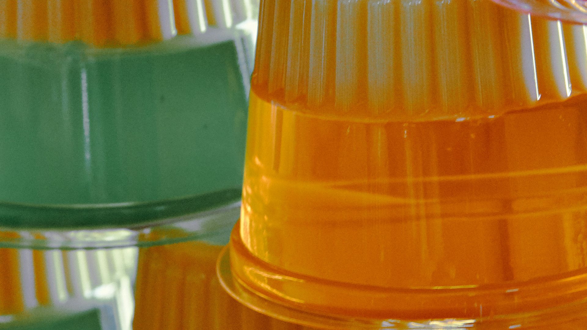 yellow and clear plastic container