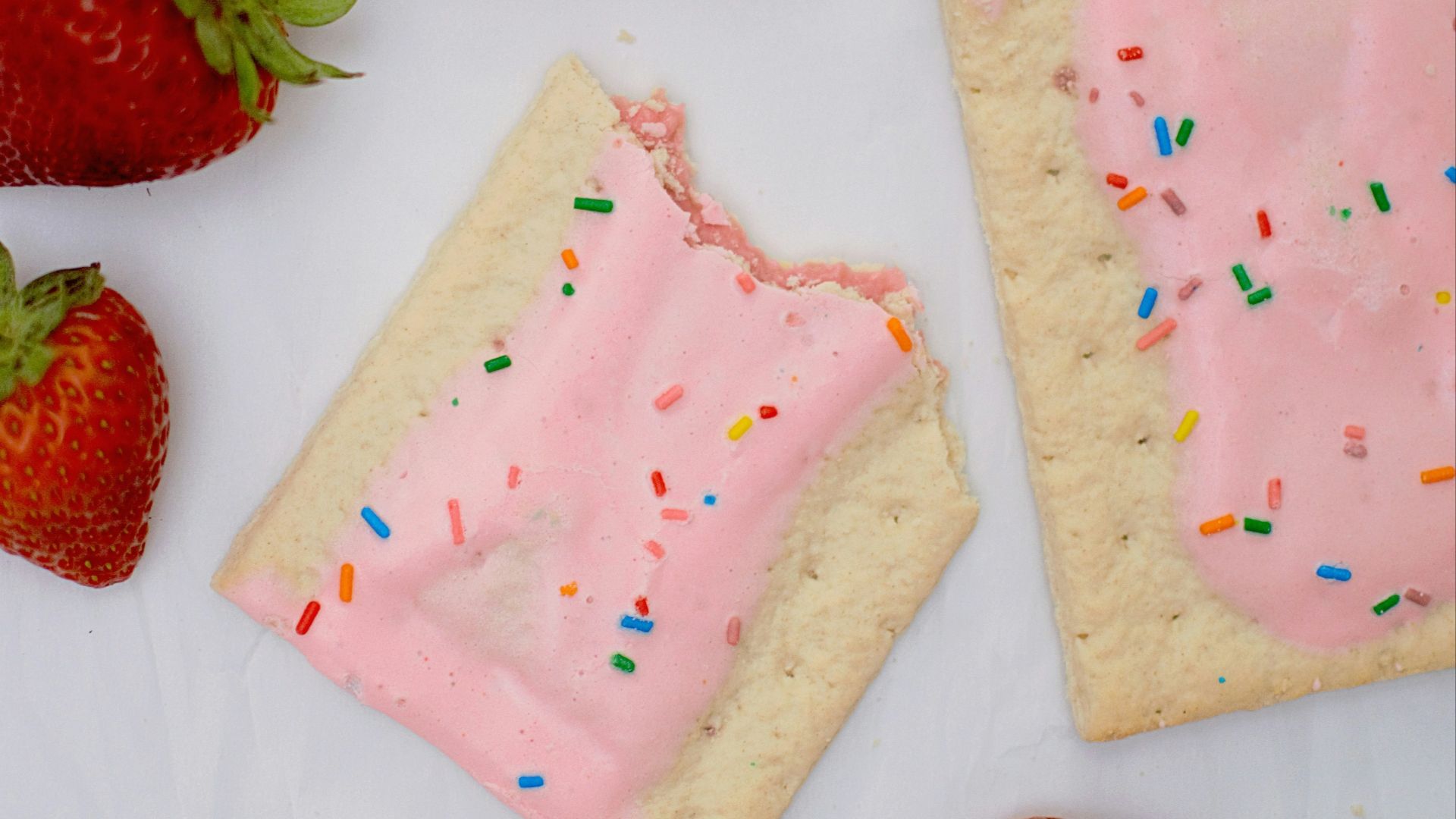 strawberries on white surface