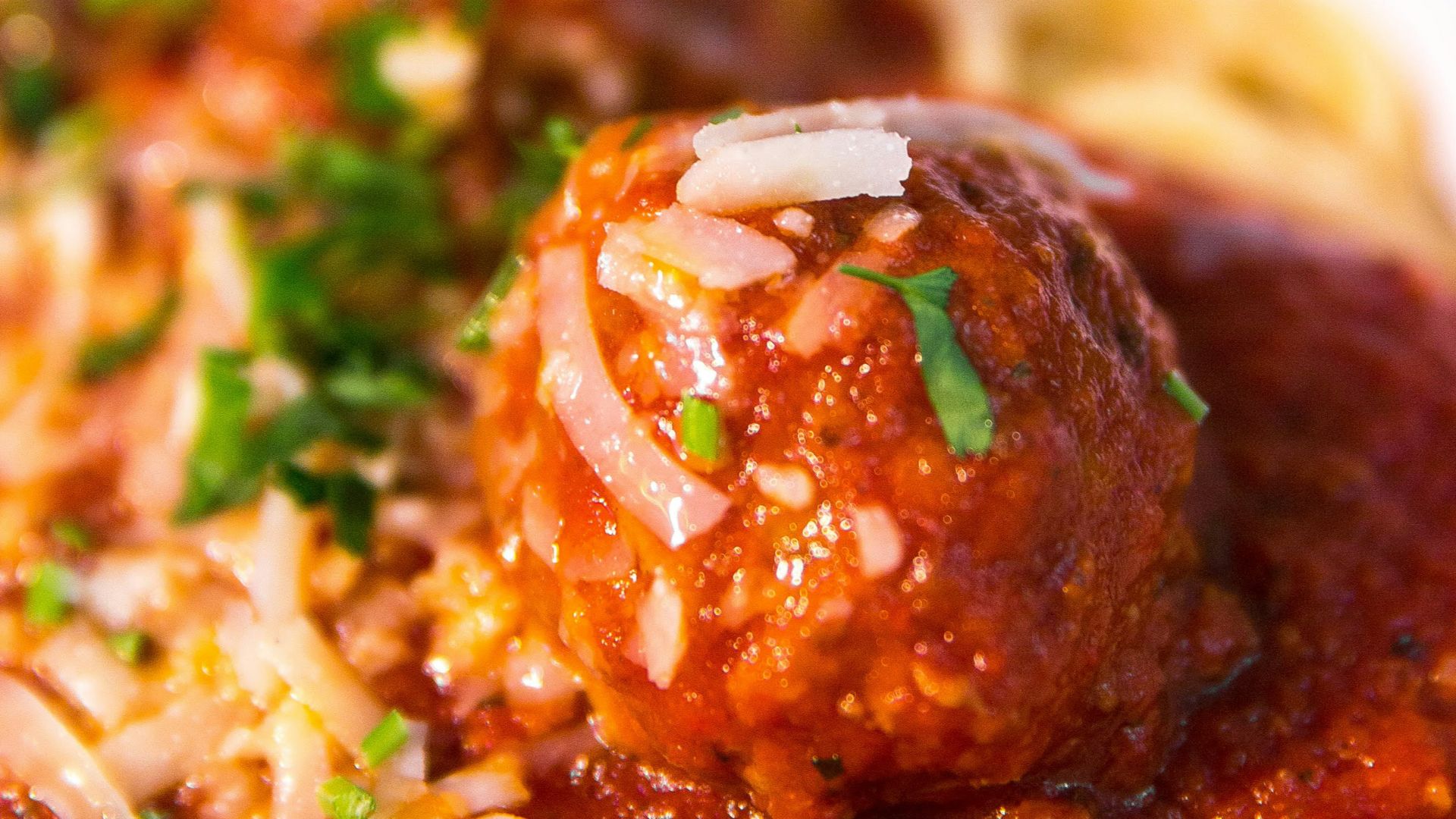 meta balls with noodles served on white ceramic bowl