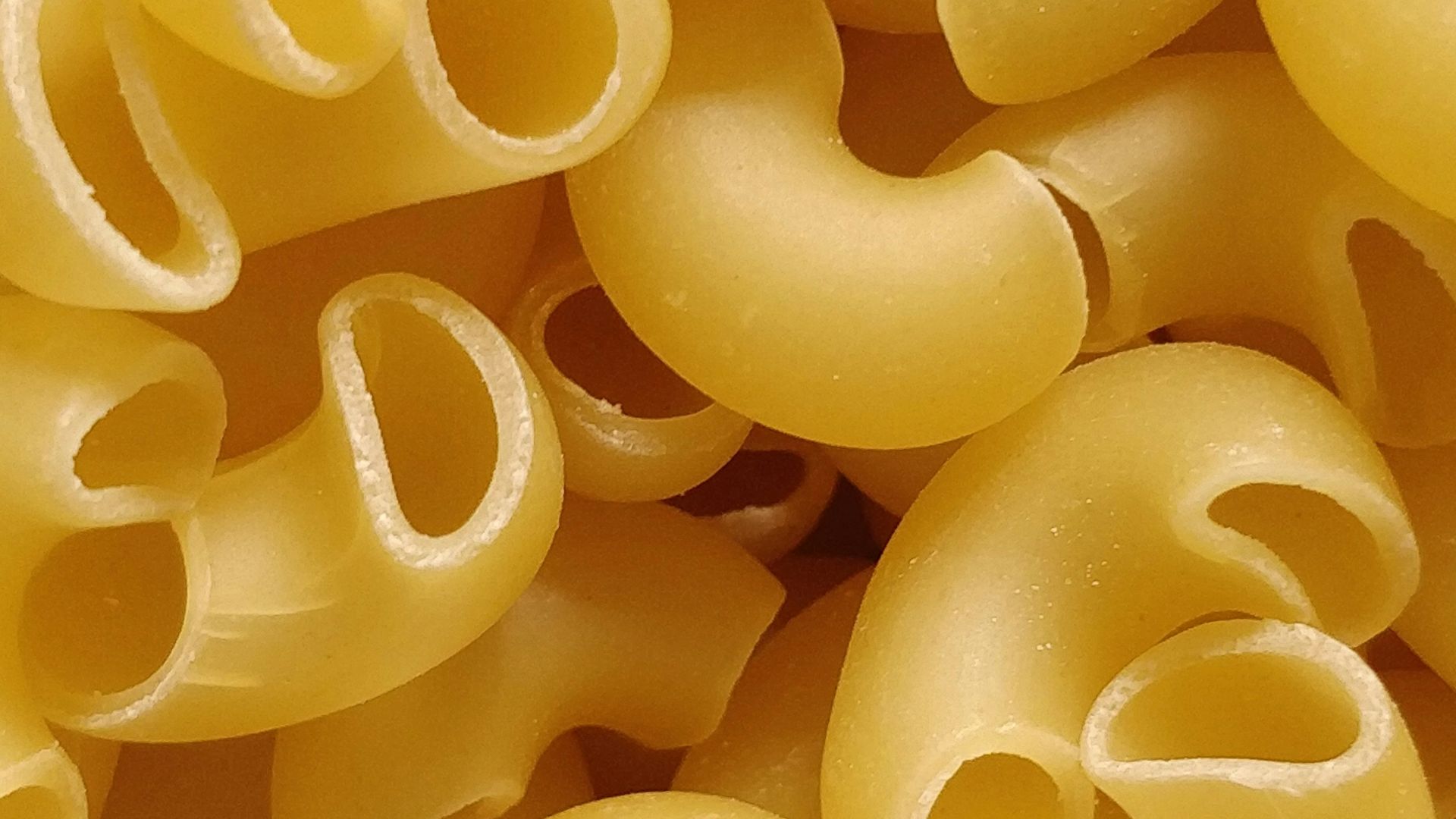yellow rubber balloons in close up photography
