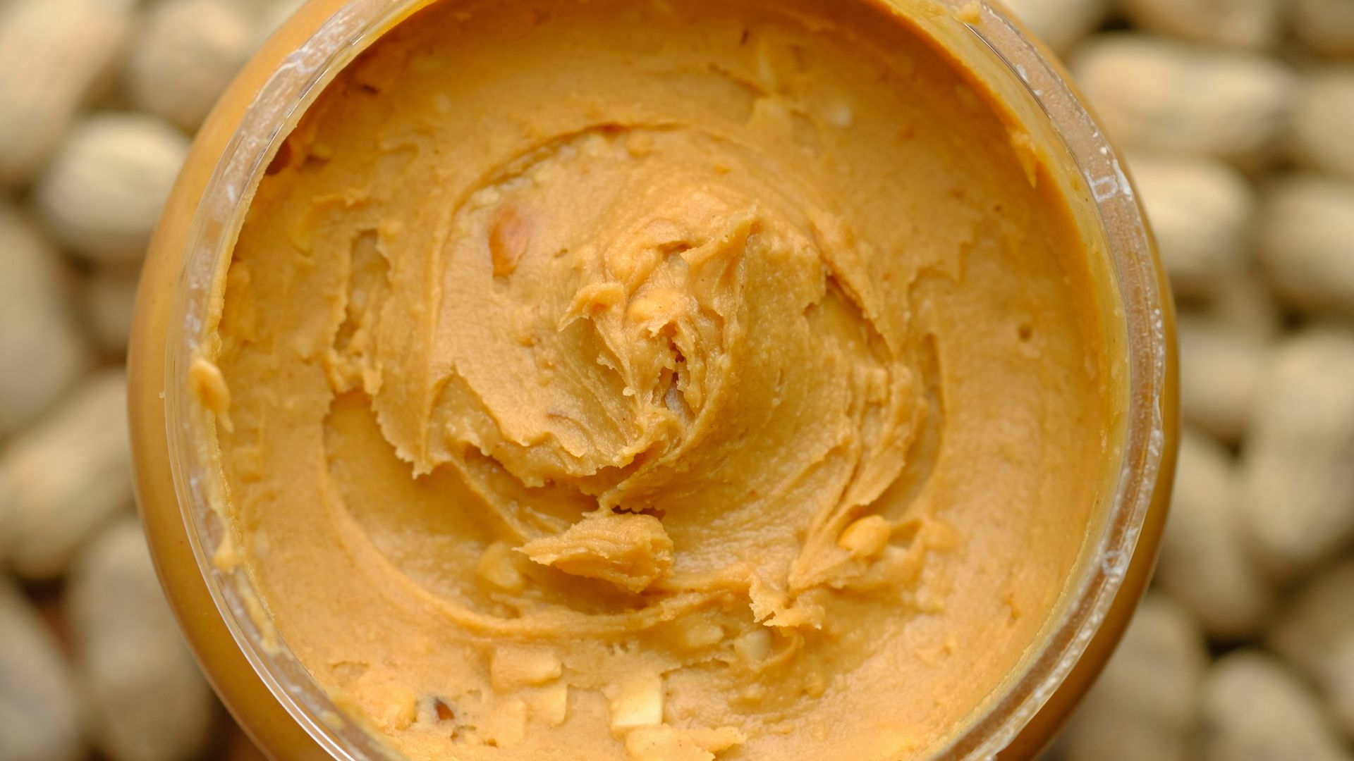 brown powder in brown round container