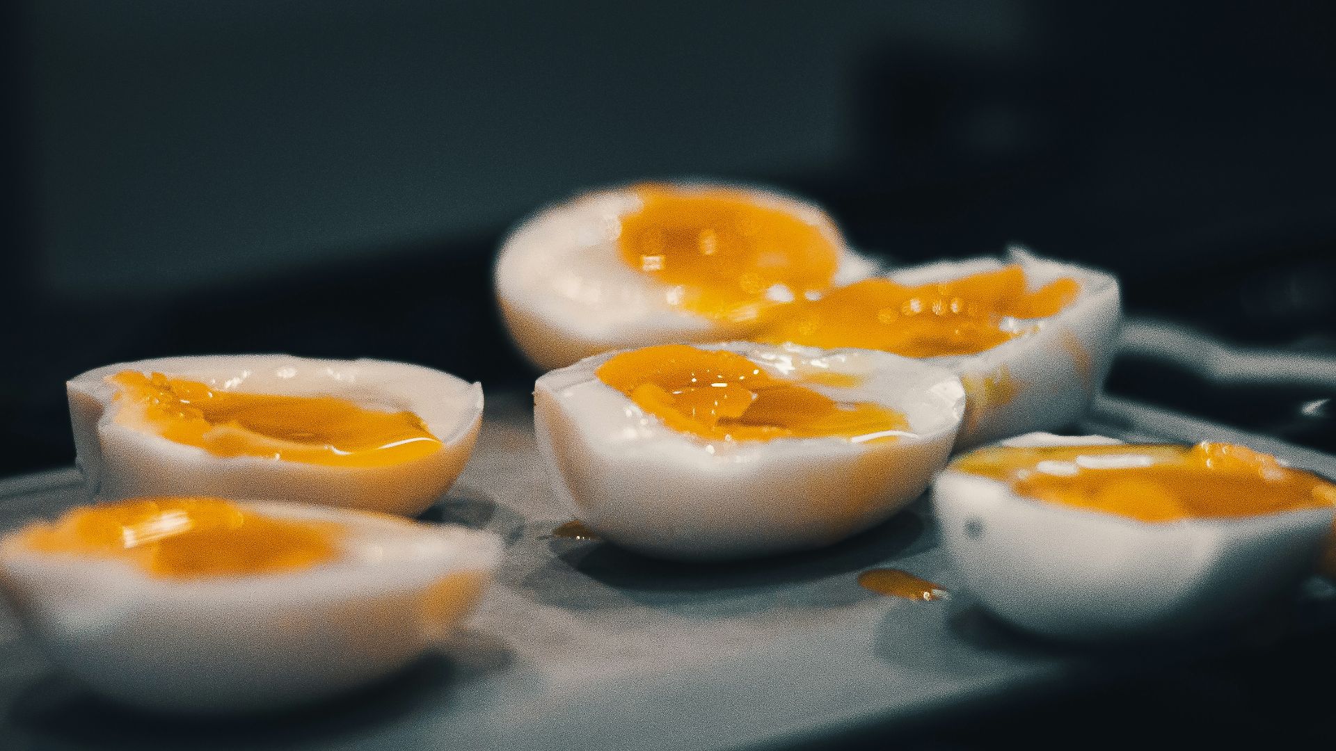 hard boiled eggs are sitting on a tray