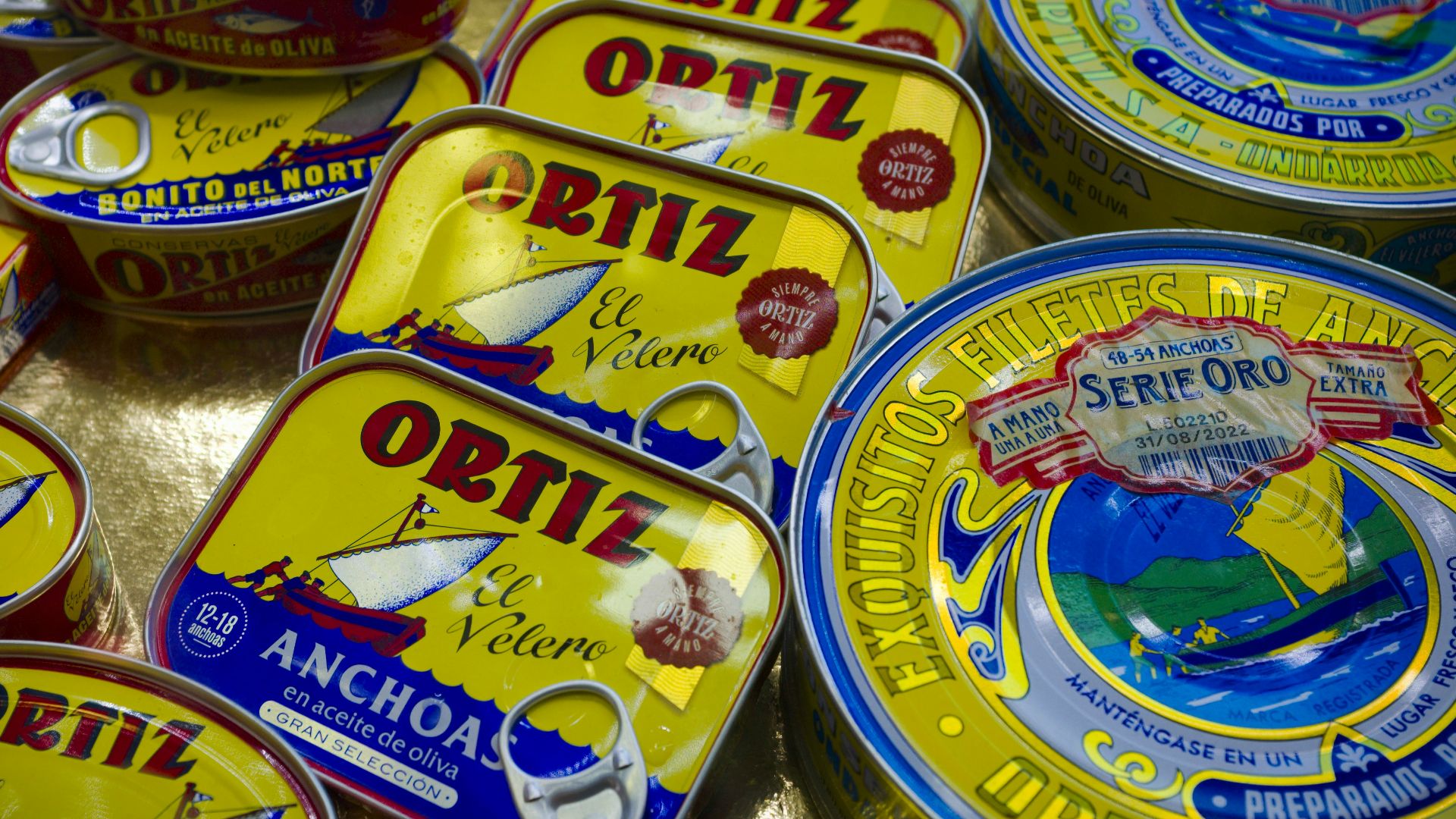 a group of tins of food sitting on top of a table