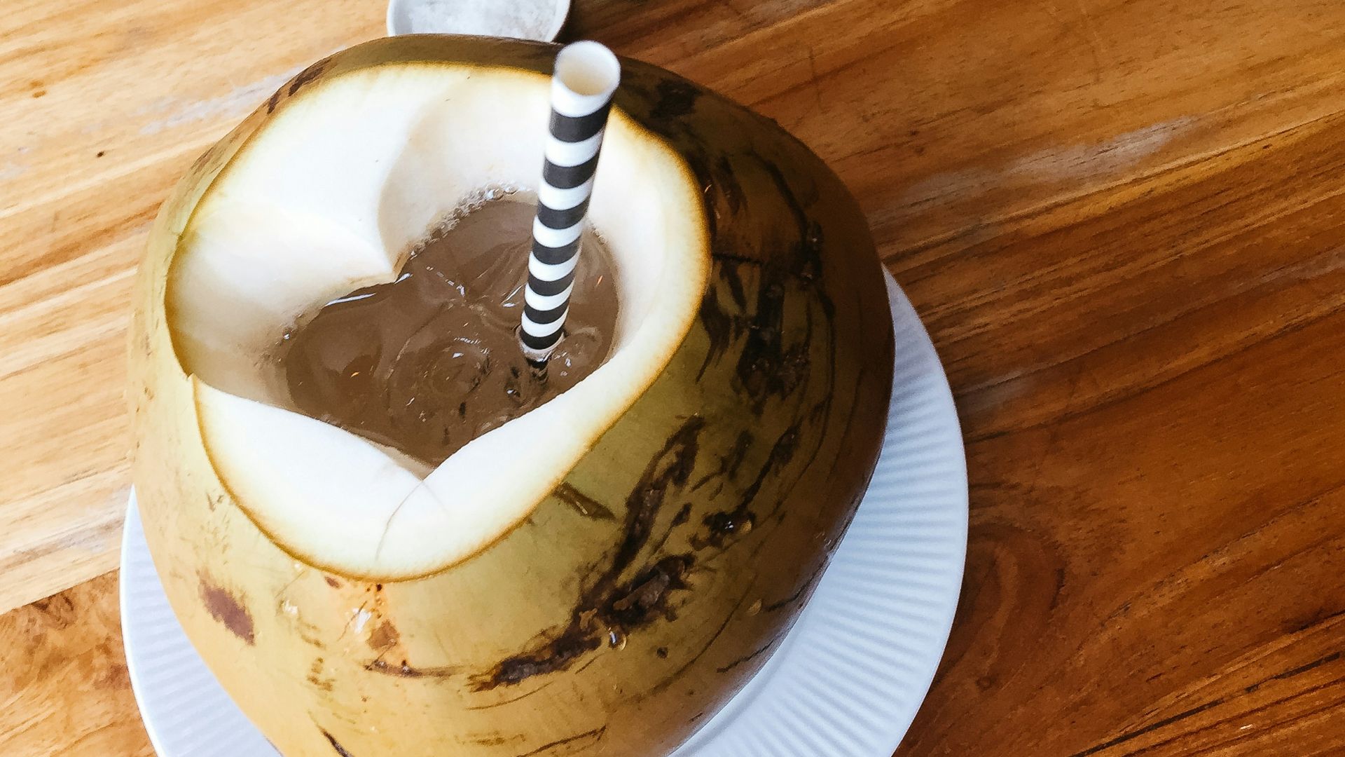 coconut dessert with straw