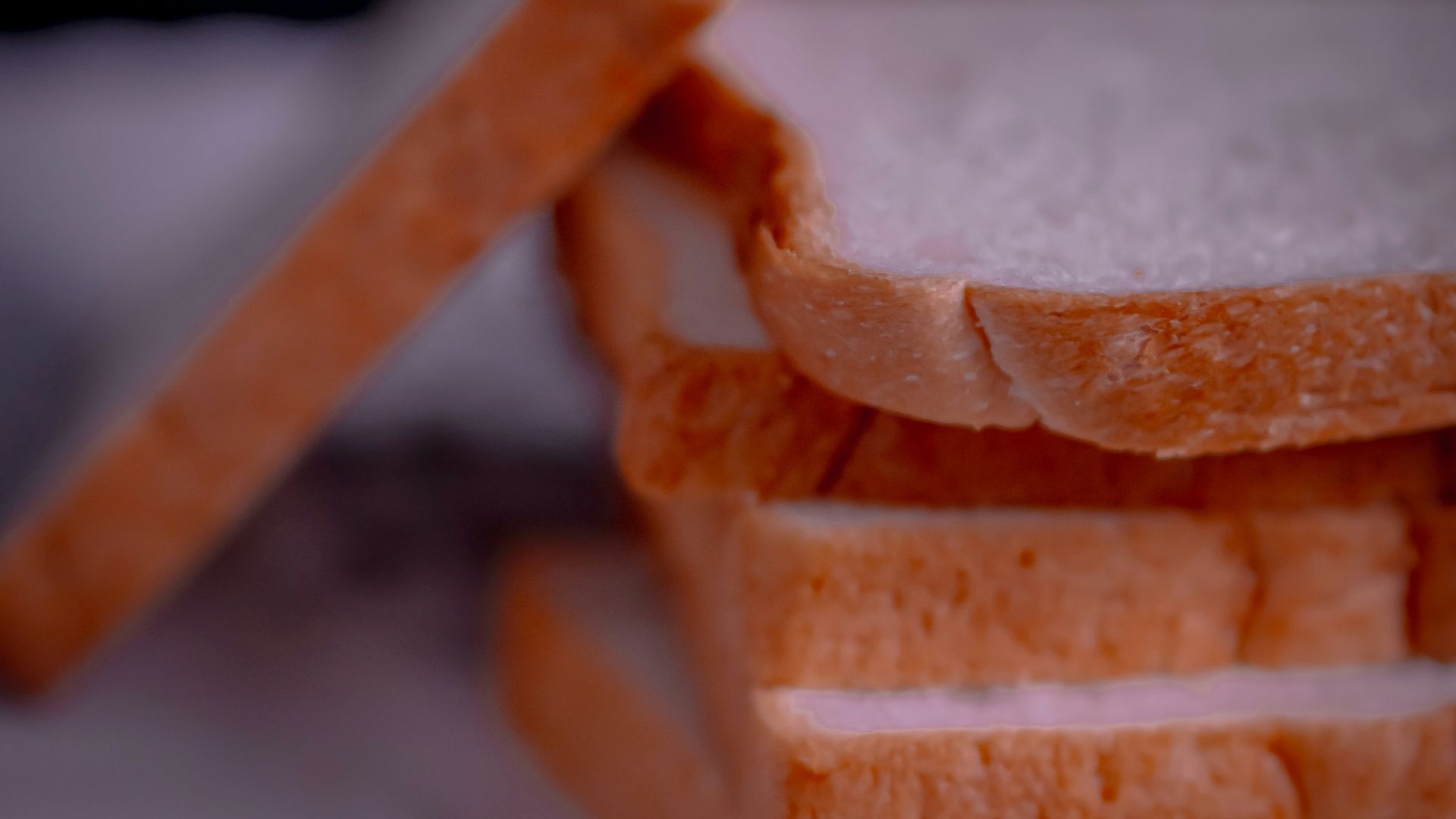a close up of slices of bread on a plate