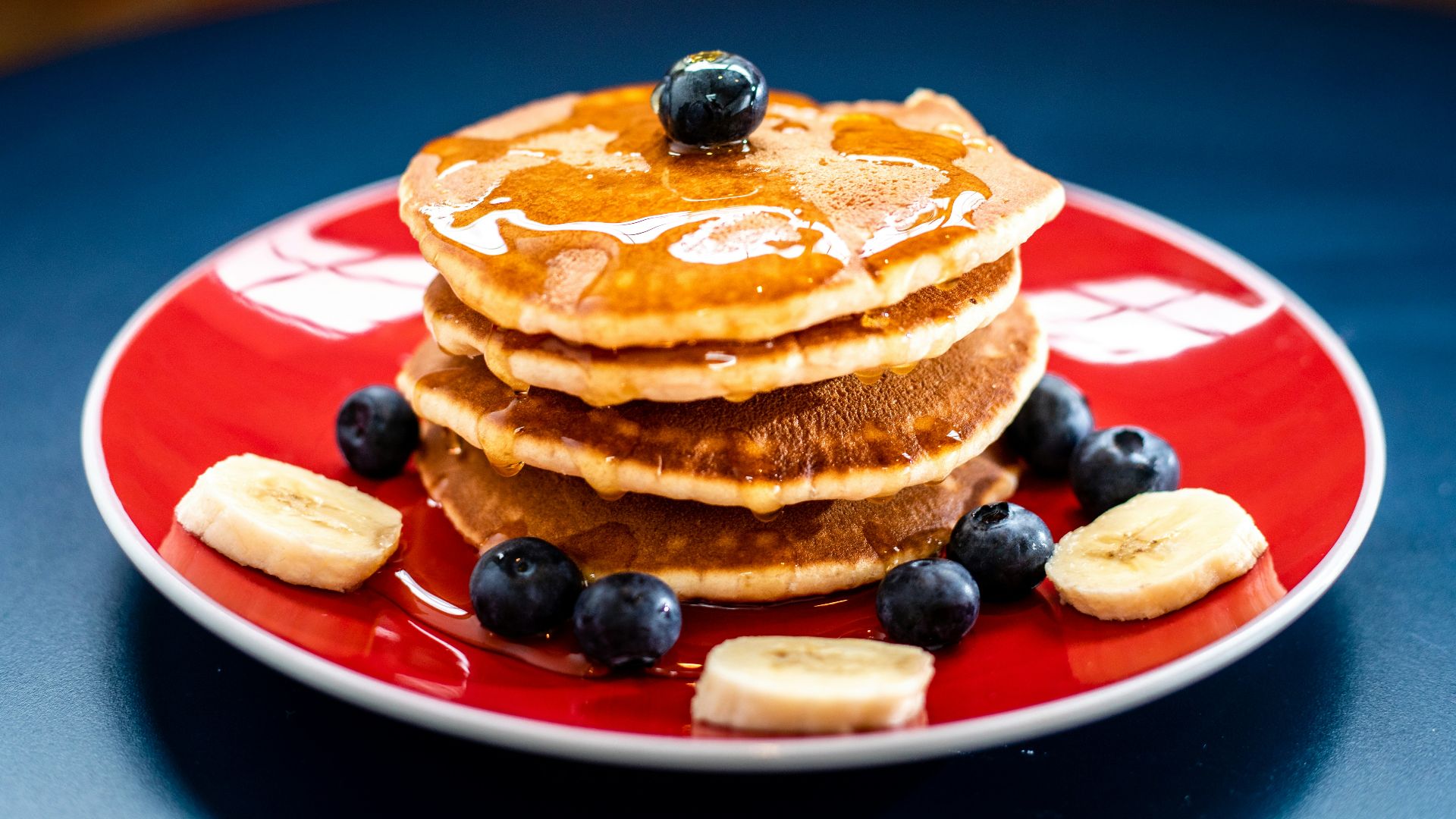 baked pancake with blueberry and slice of banan